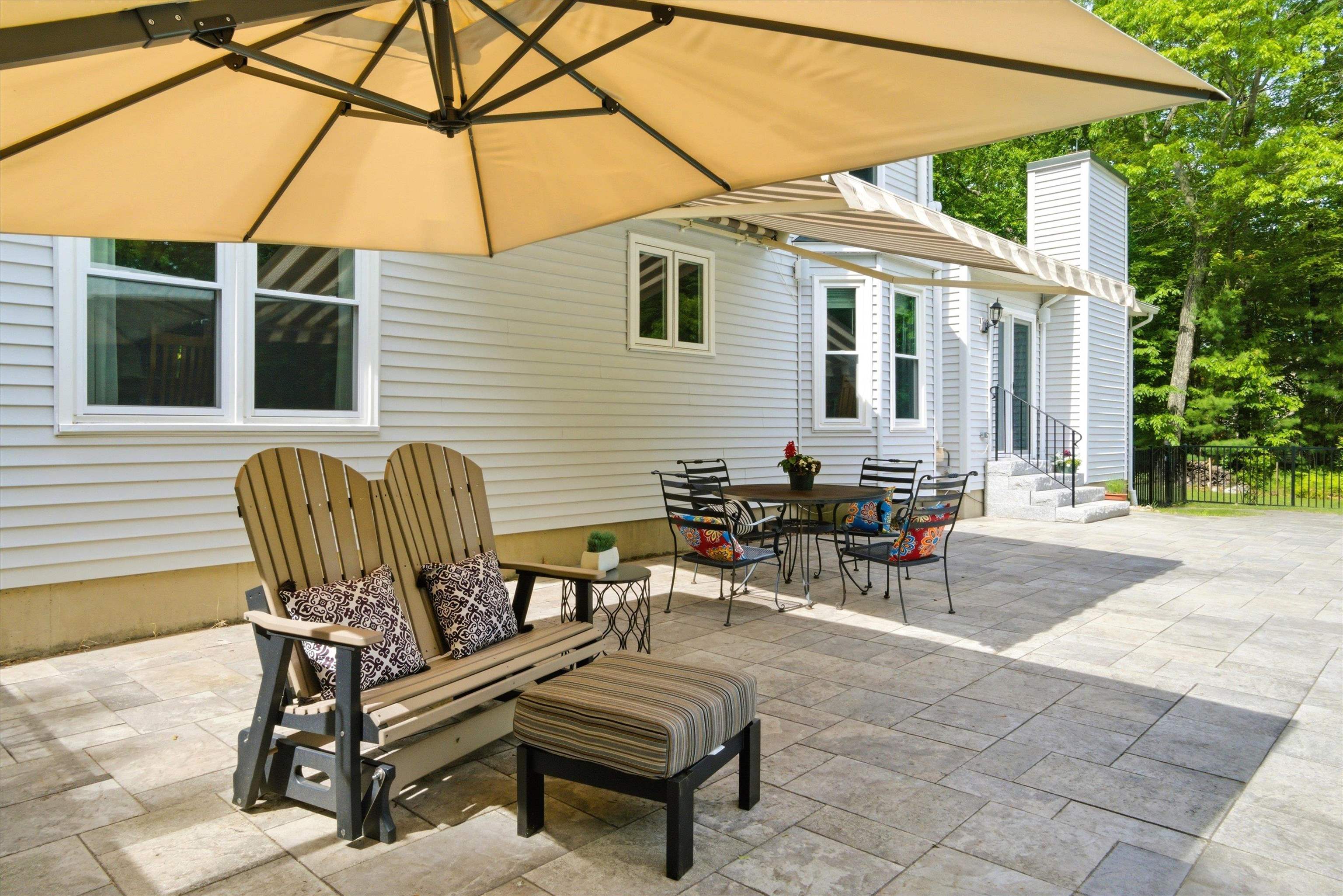 Spacious patio perfect for outdoor dining, relaxing, and gathering with friends.