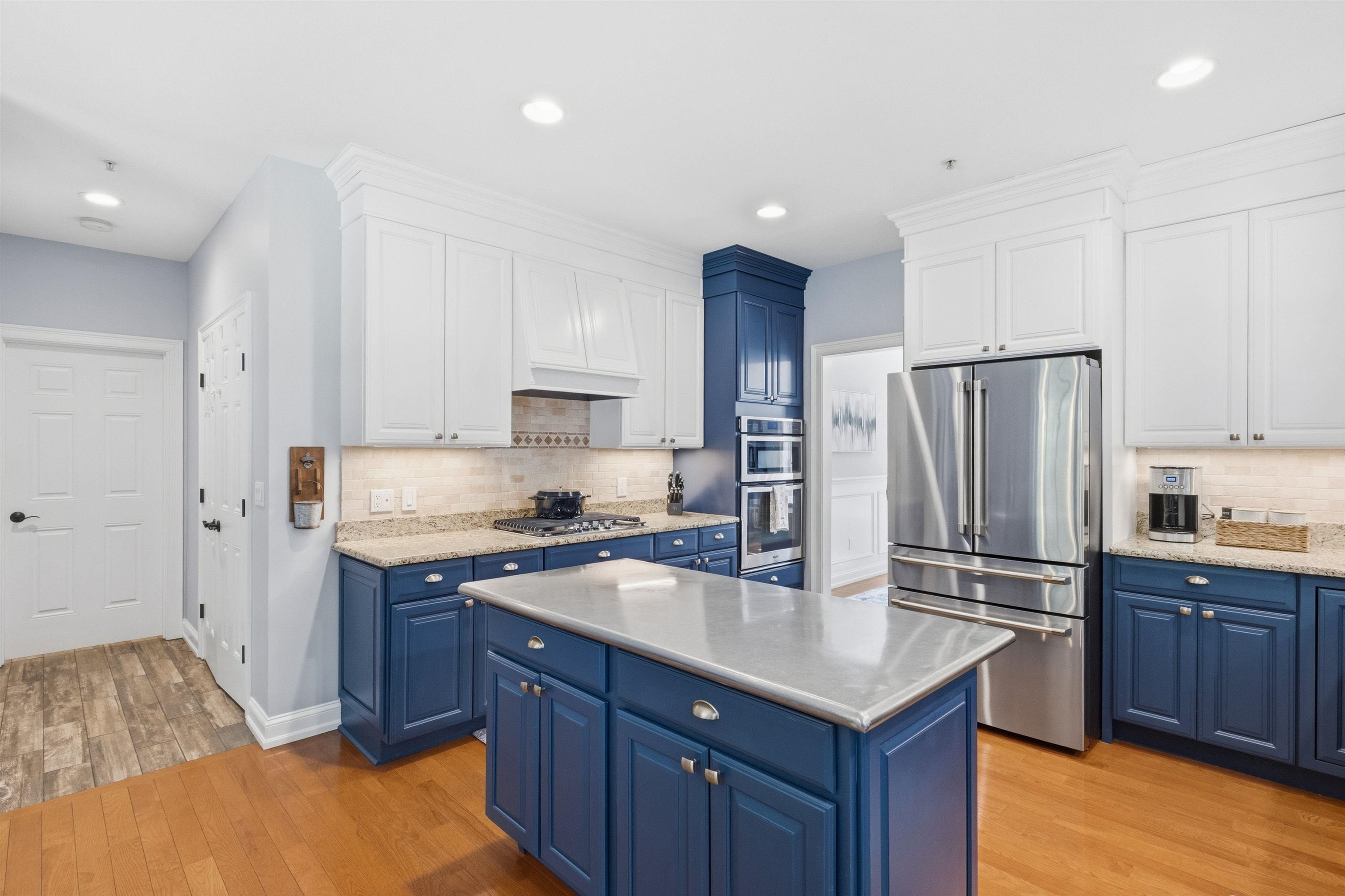 Yes!  Beautiful Blue Raised Panel cabinetry
