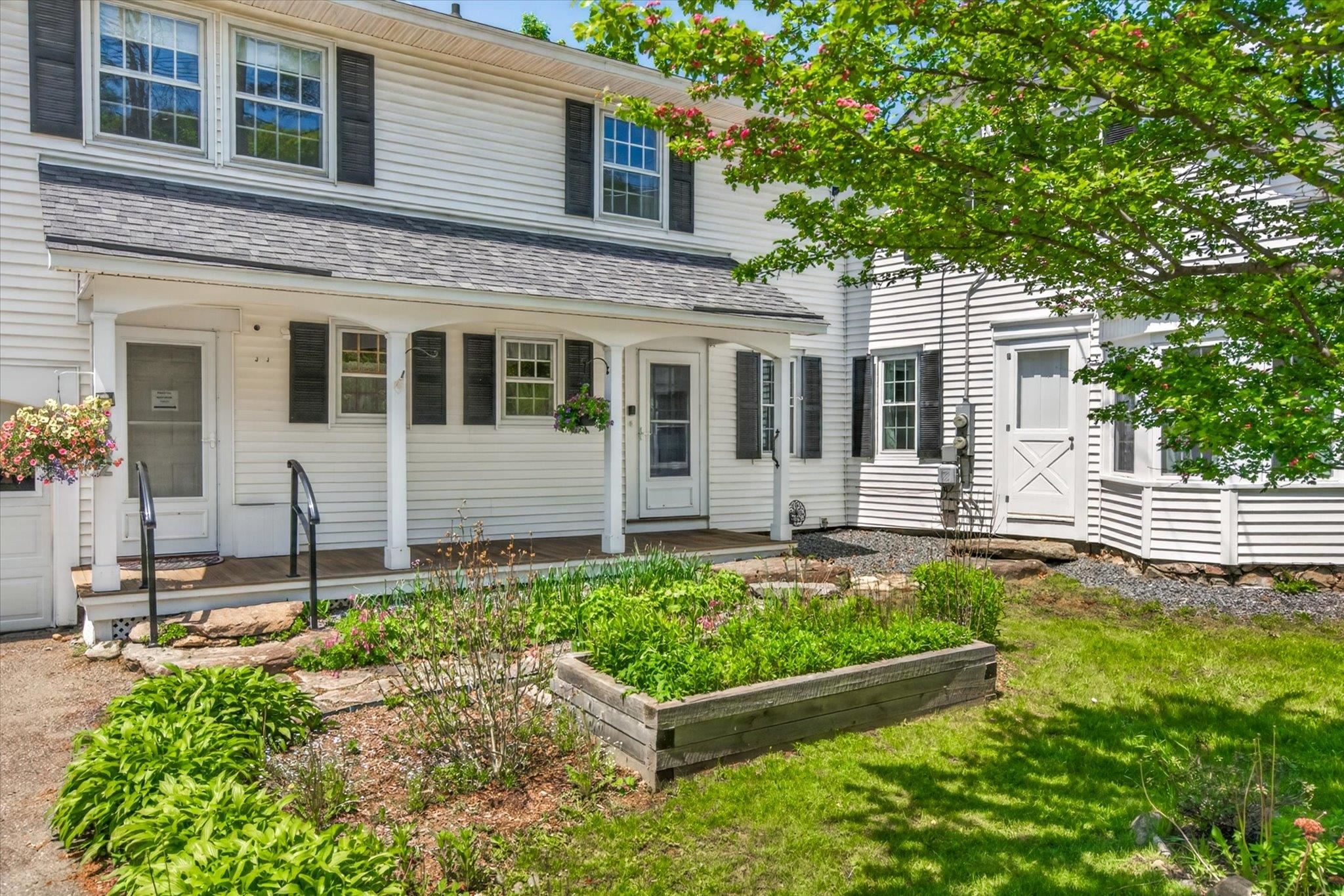 front porch and raised bed gardens