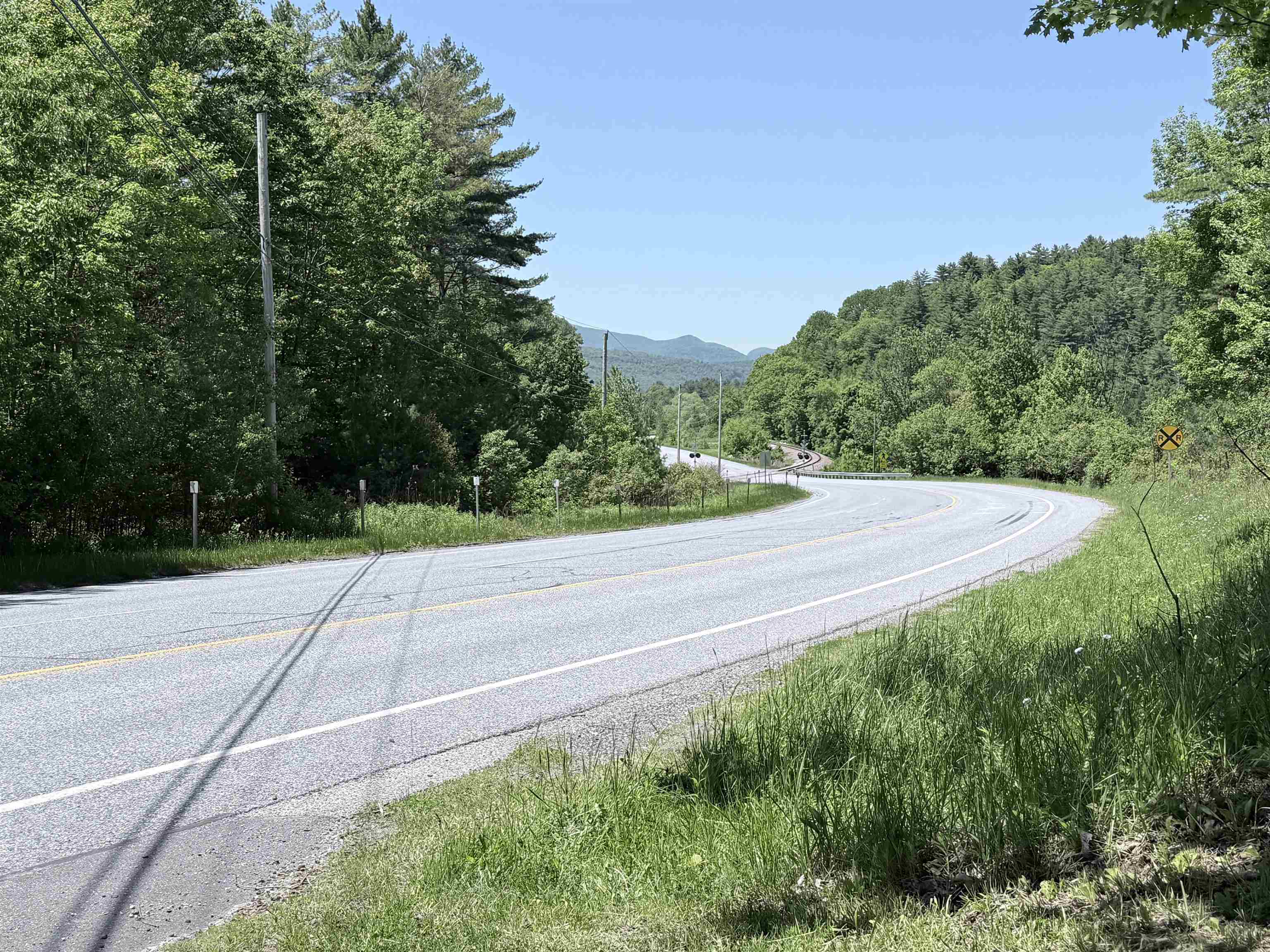 The Appalachian Trail crosses at the bend in the road