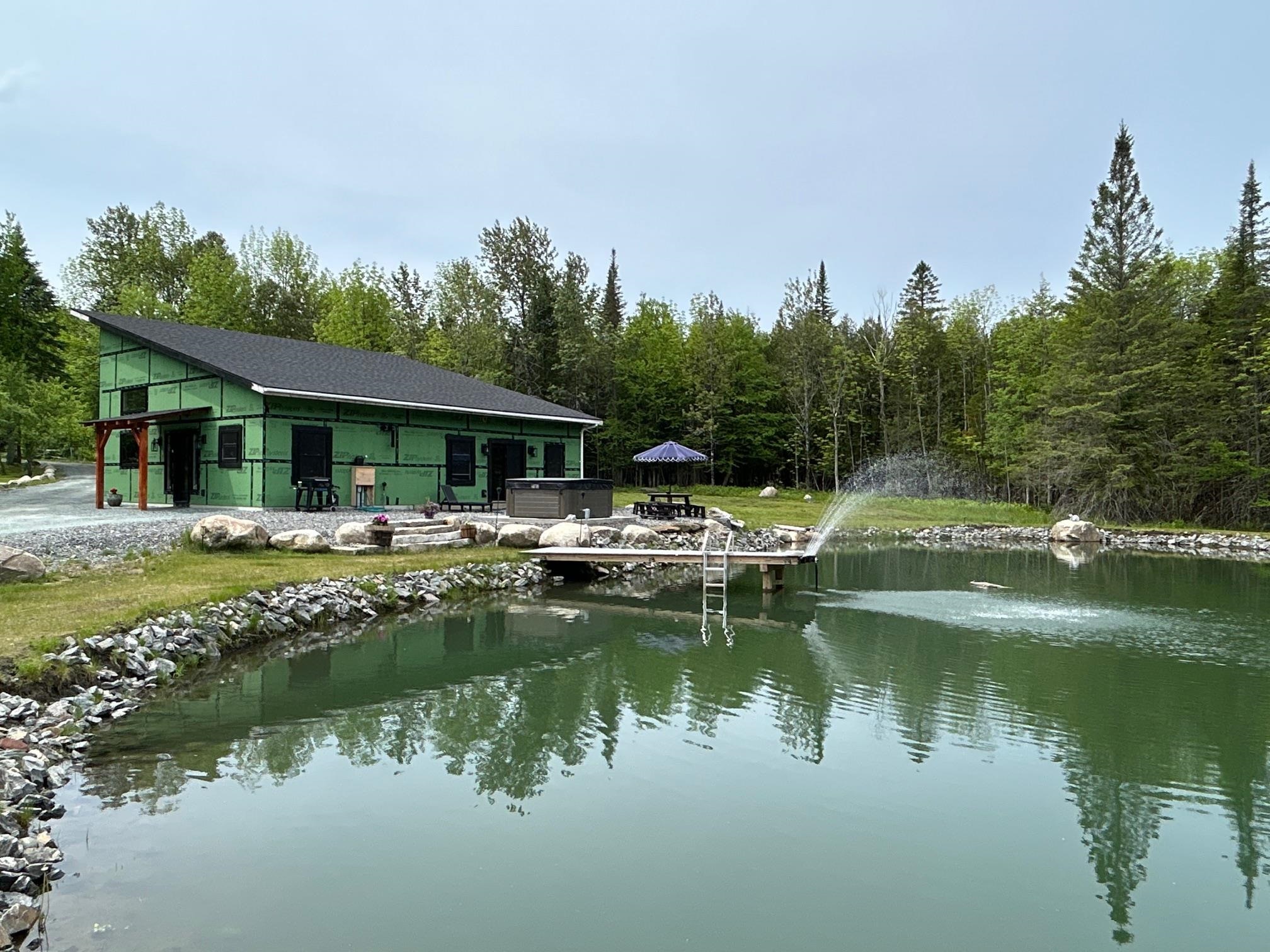 Pond, home and hot tub!