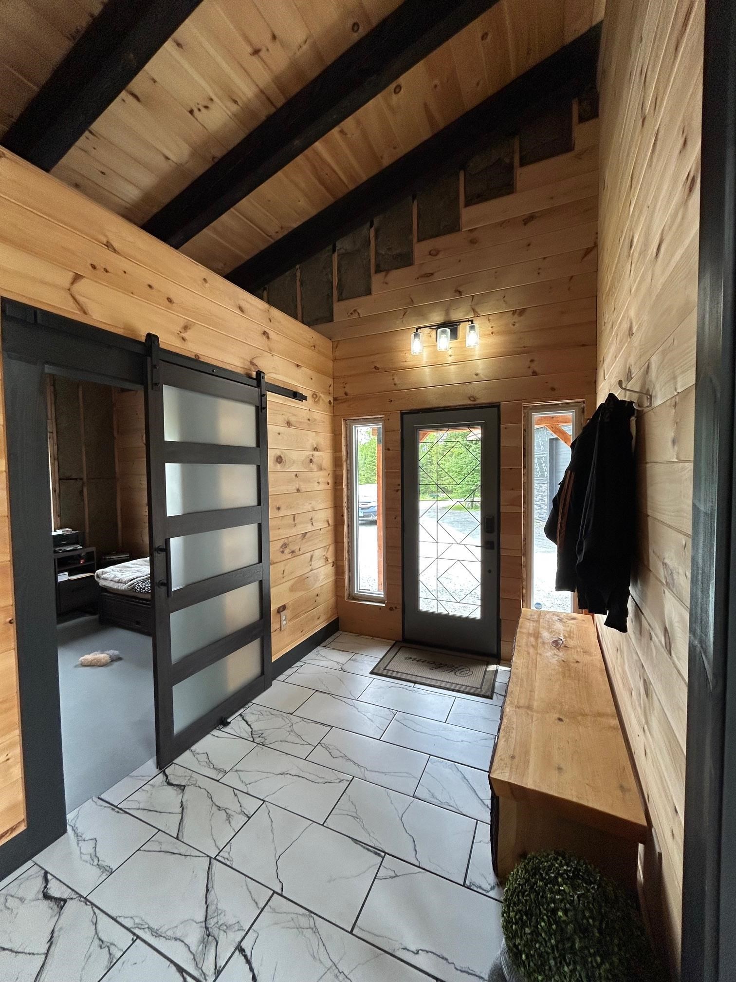 Entry to home with Bedroom 2 to LEFT
