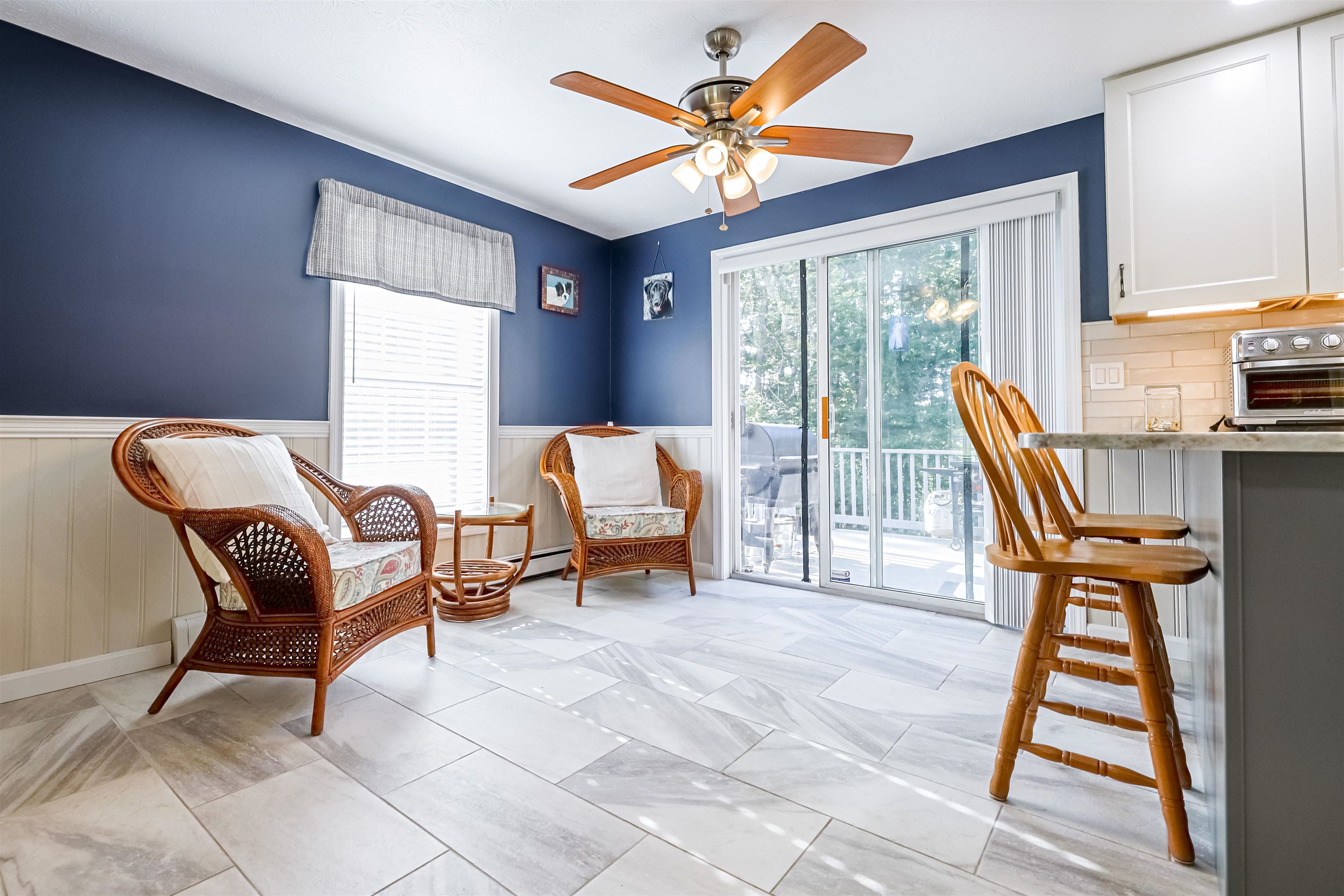 Sitting room overlooking decks and pool