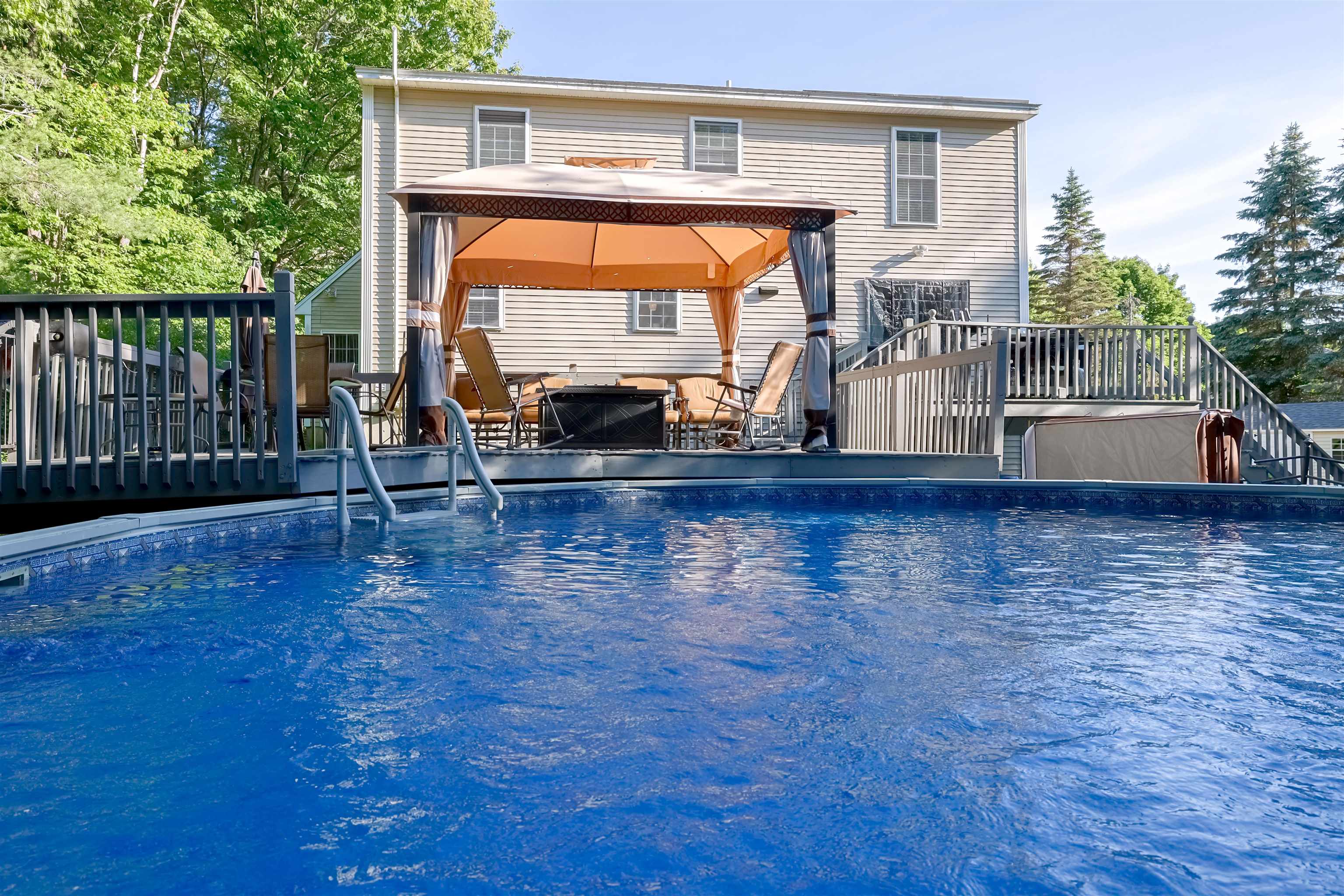 Newer DoughBoy 25 ft AG pool built into the trex decking
