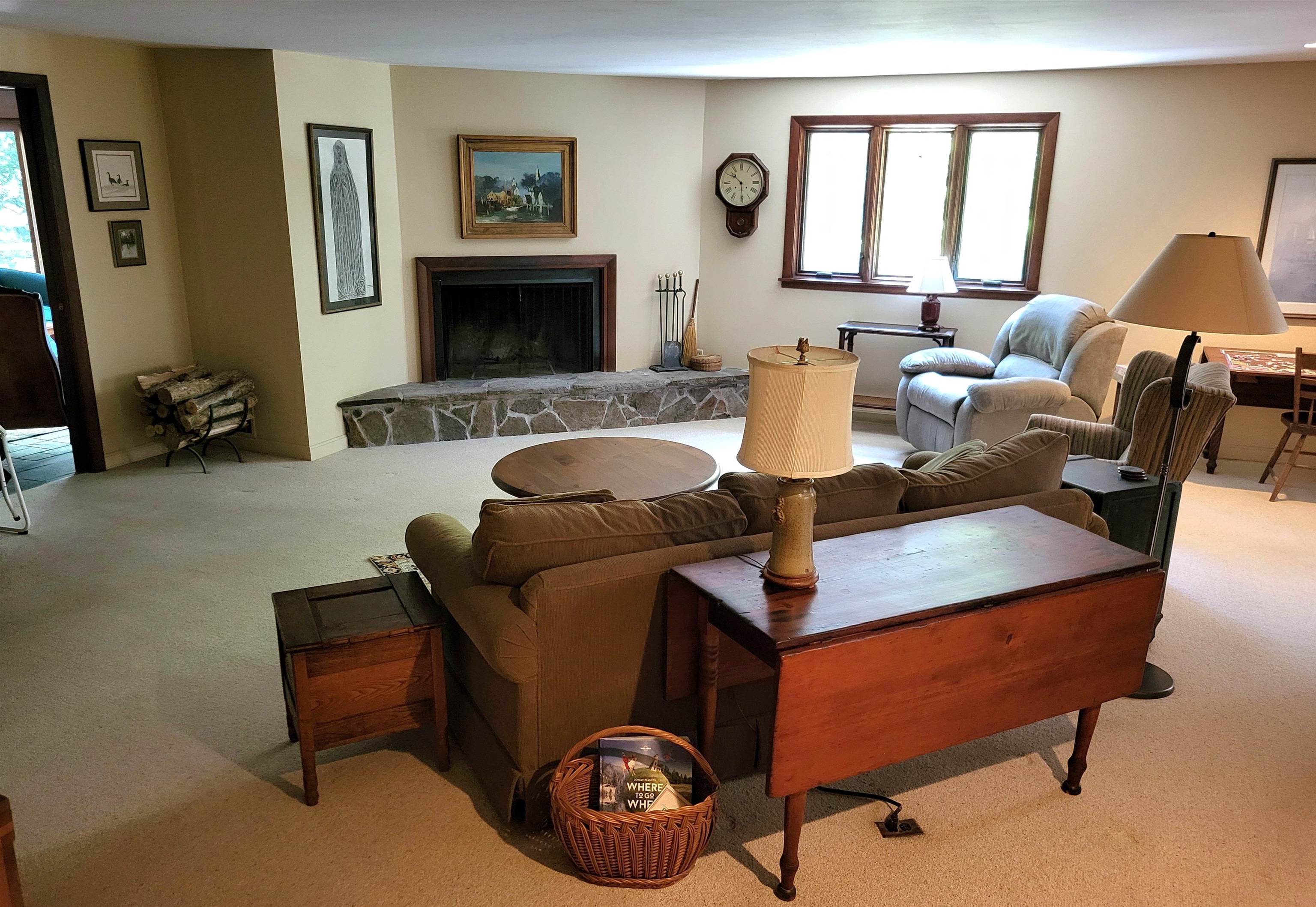 Family living room with fireplace 25863909