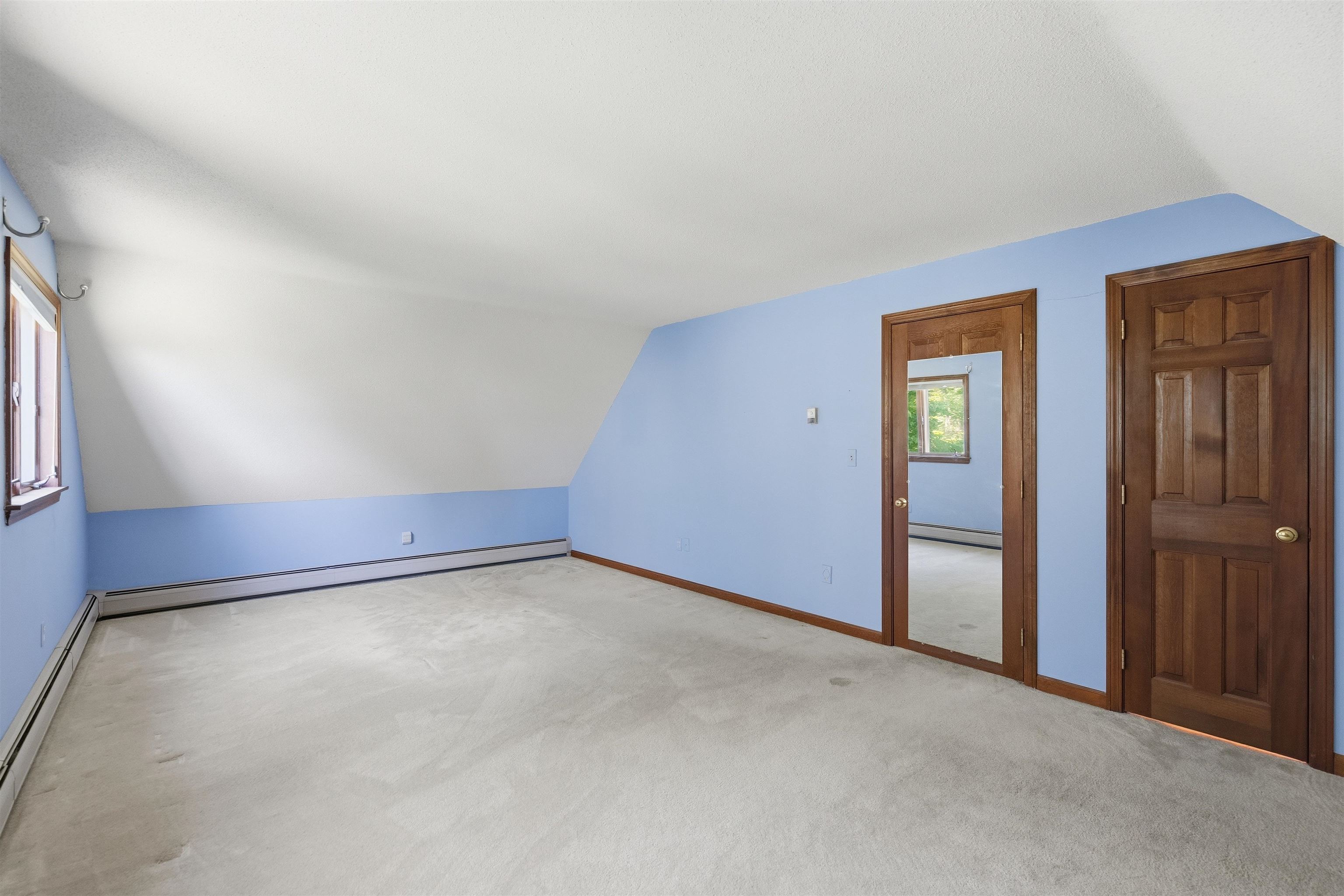Bedroom three with walk-in closet 25498095