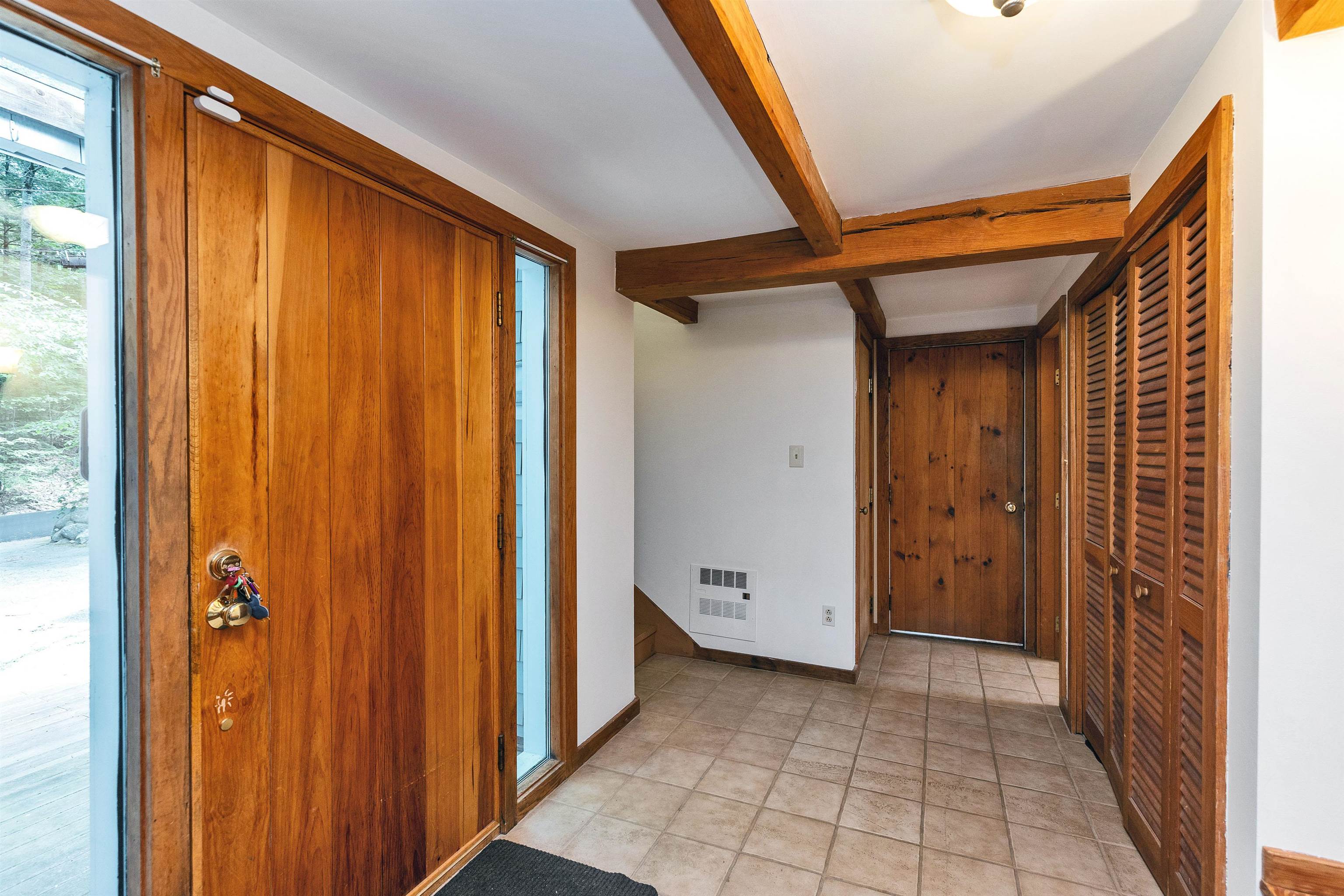 Stair way off entry to guest room