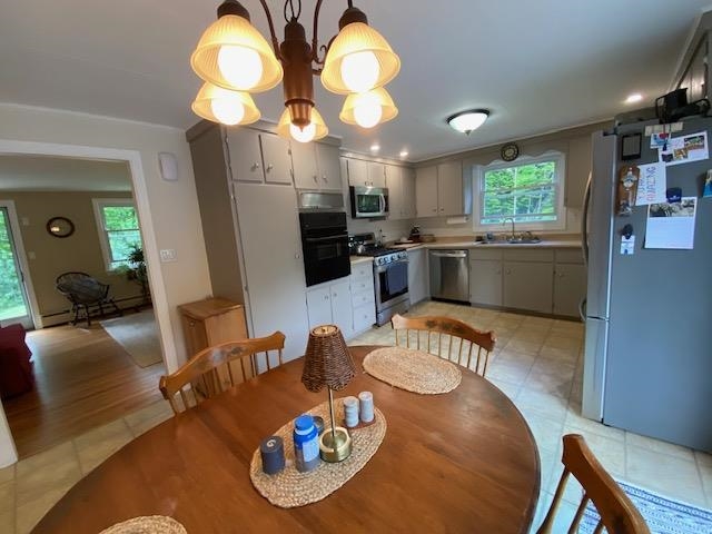 Kitchen open to dining 25655328