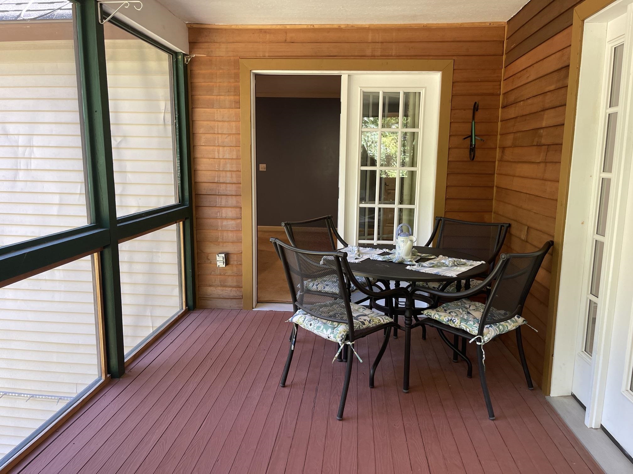 A DOOR FROM THE MASTER BEDROOM TO THE PORCH IS A GREAT FEATURE