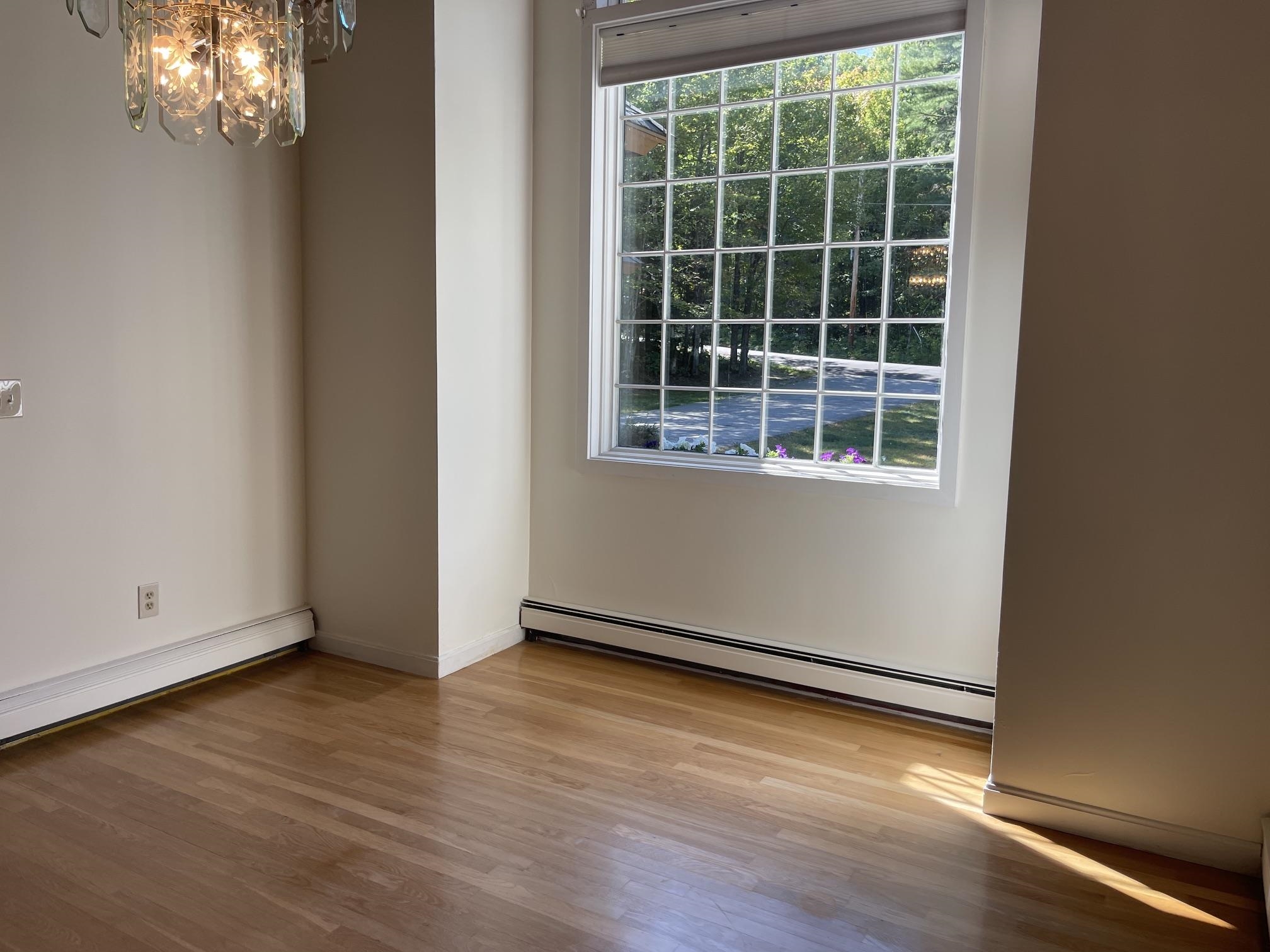 THIS ROOM LOOKS TO THE FRONT YARD AND THE PEACEFUL SUNSETS IN THE WESTERLY SKIES.