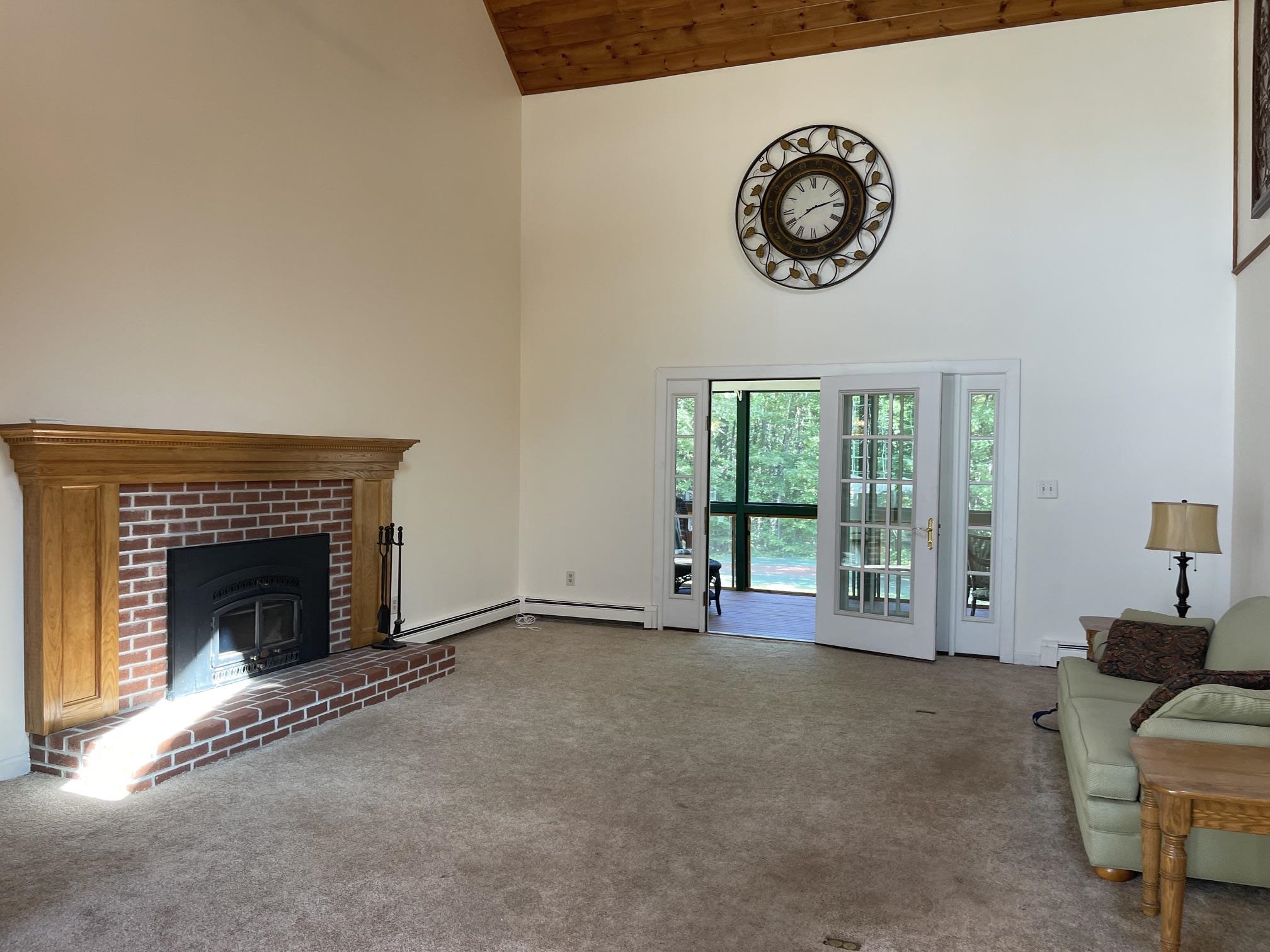 THE DINING AREA OPENS TO A SPACIOUS LIVING ROOM.