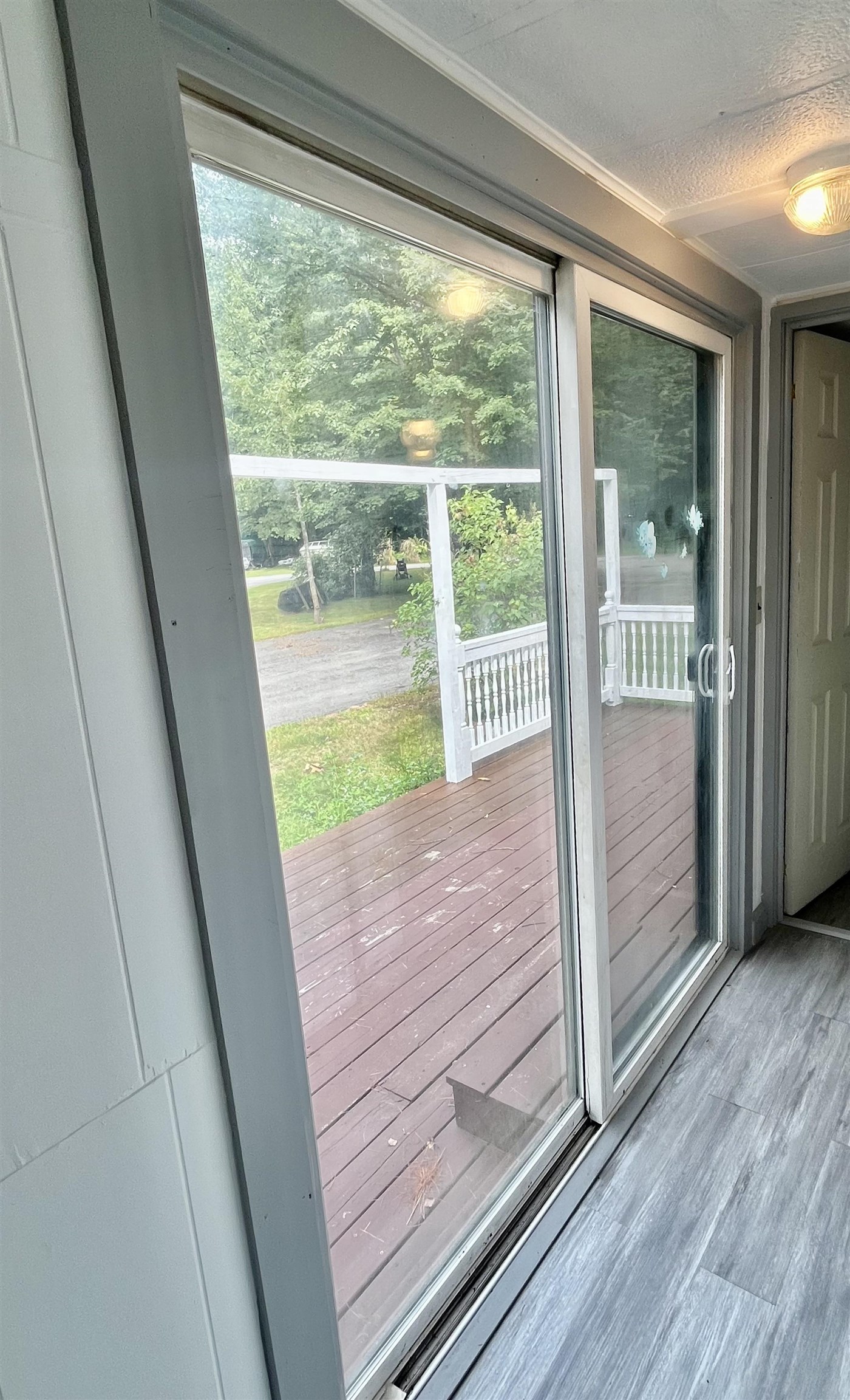 Sliding Door Leading to Large Front Deck