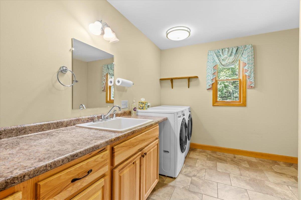 Main Floor Laundry room with Full Bathroom off Hall