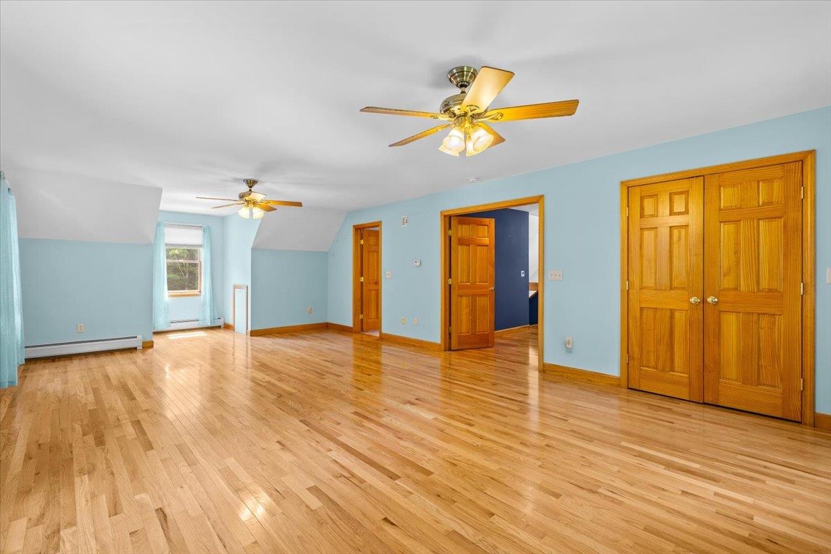 Private Primary Bedroom with Hardwood Floors