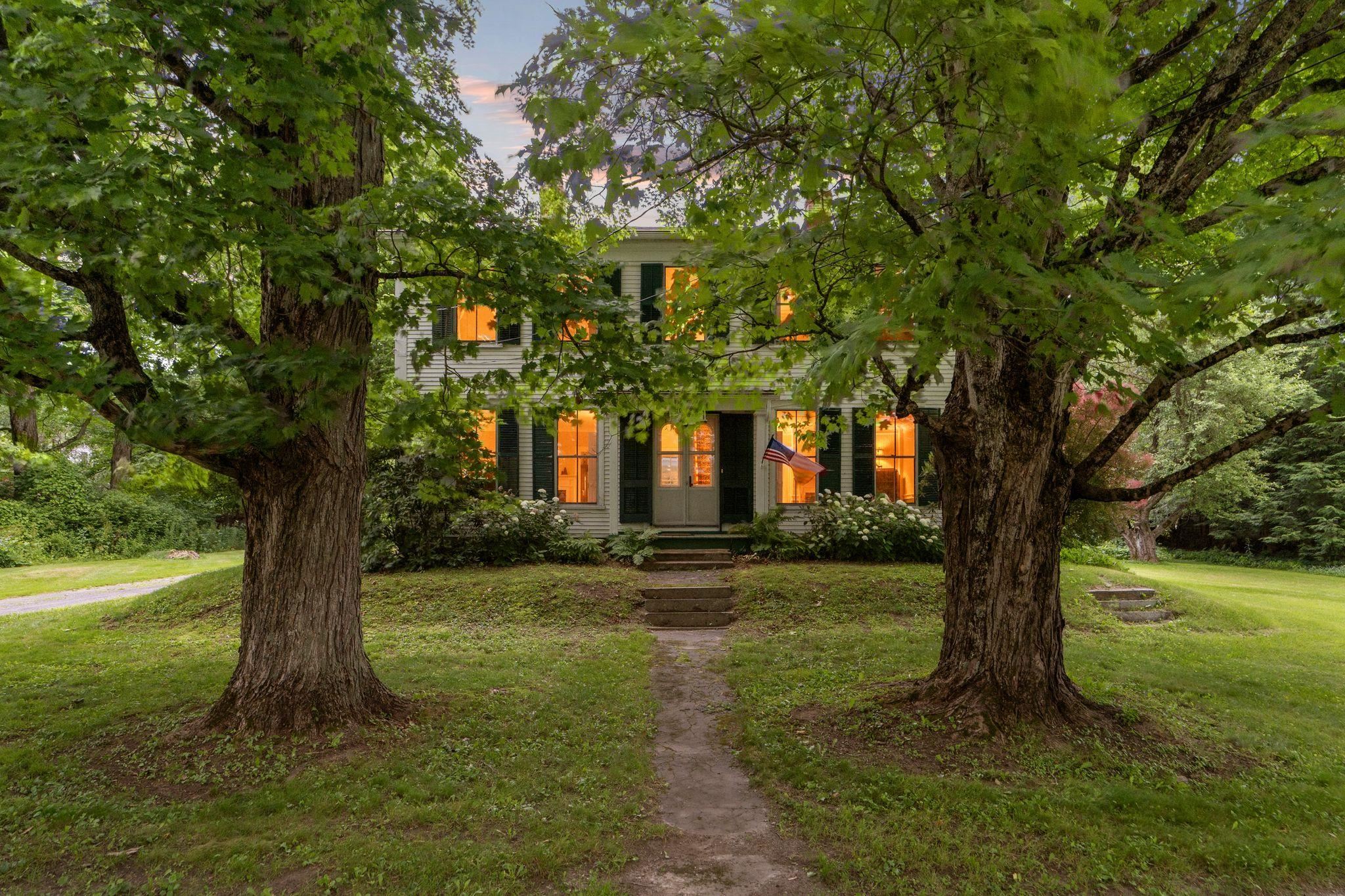 Sloan House flanked by historic maples