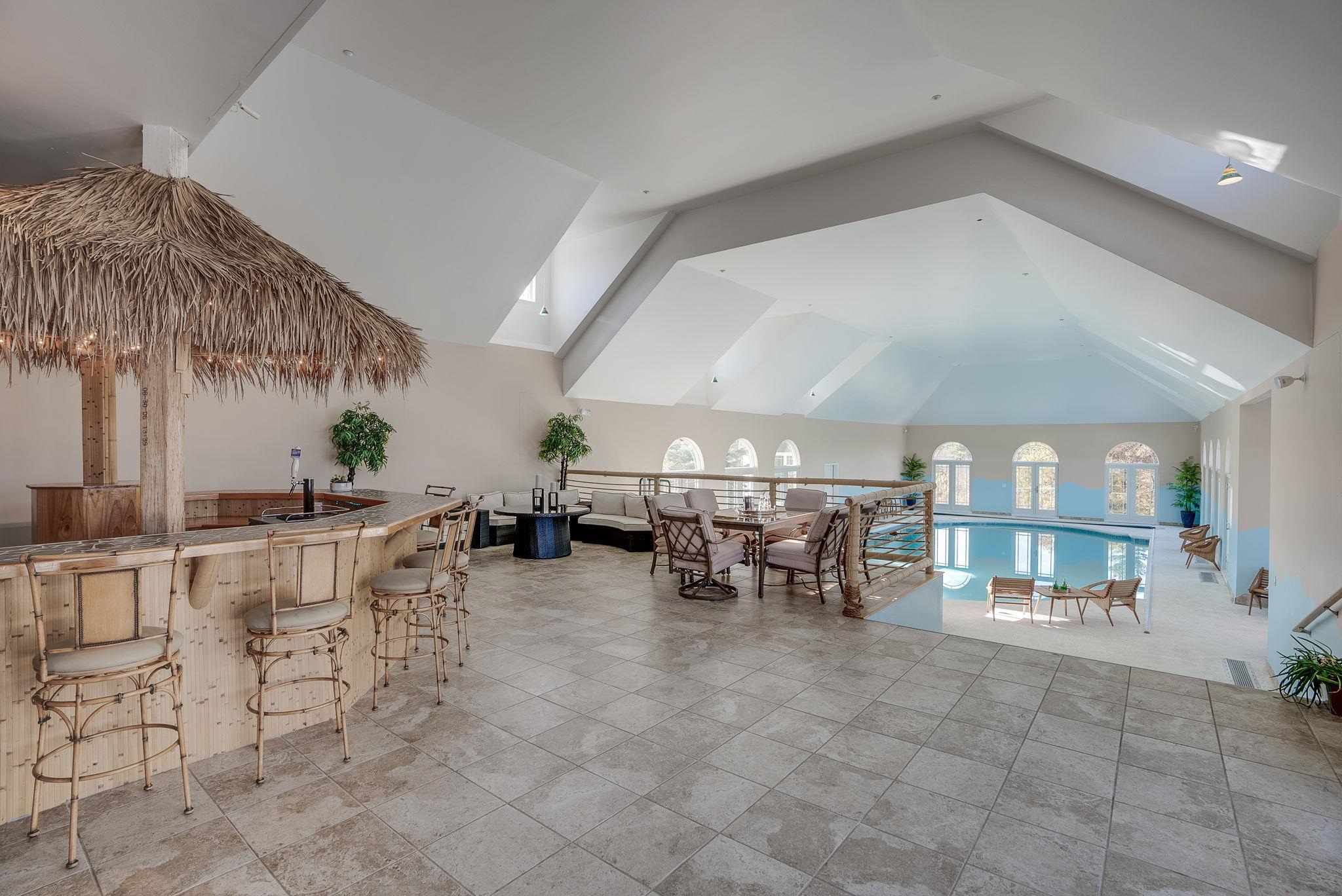 Tiki Bar and Lounge Area Overlooks Pool