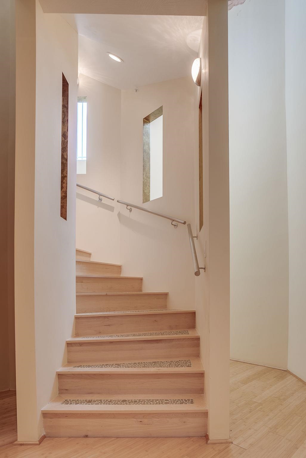 Hardwood Stairs w/ Stone Inserts to Lower Level