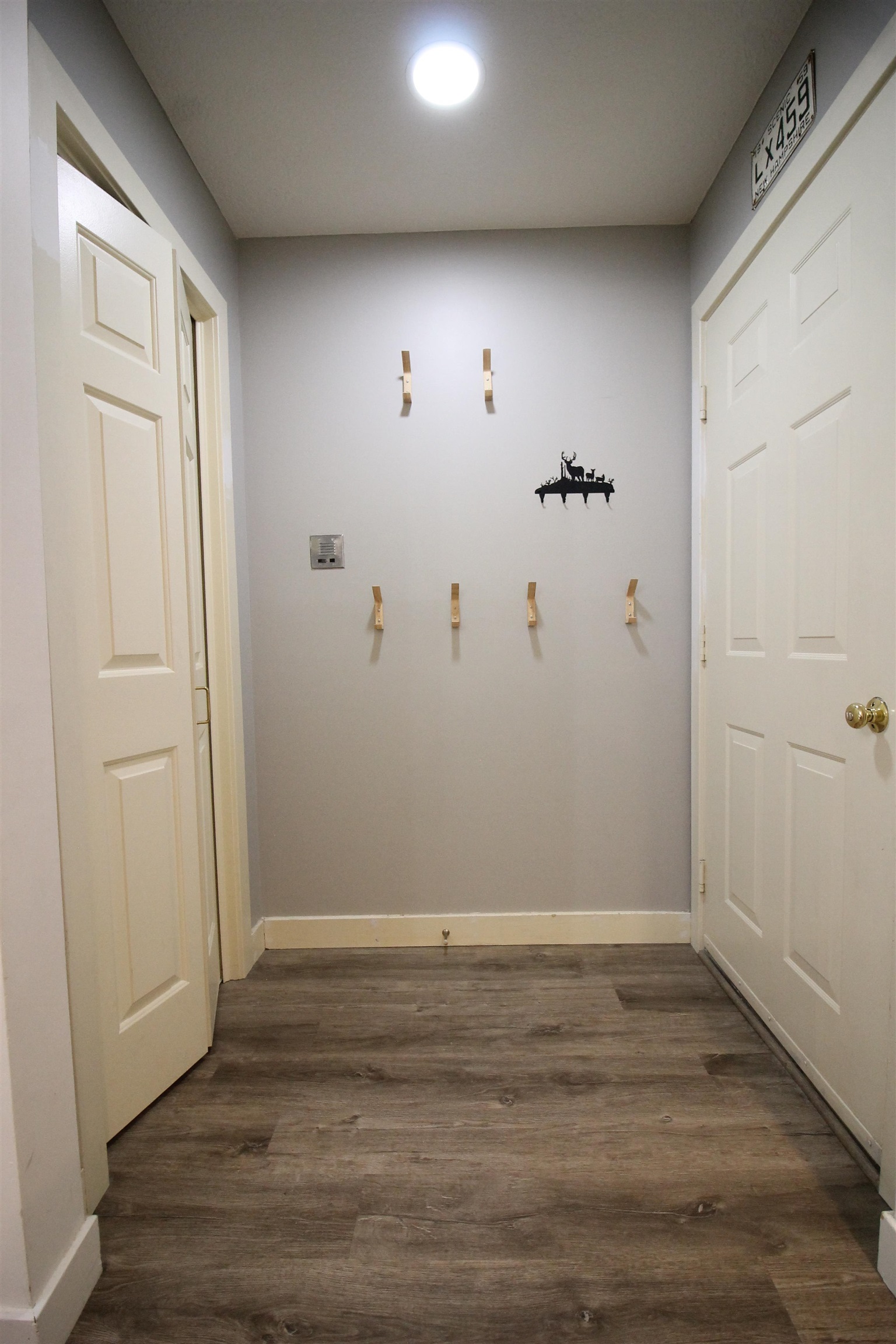 Mudroom area with closet