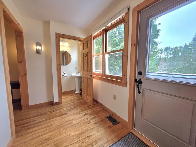 hallway outside of half bath in main house 25818760