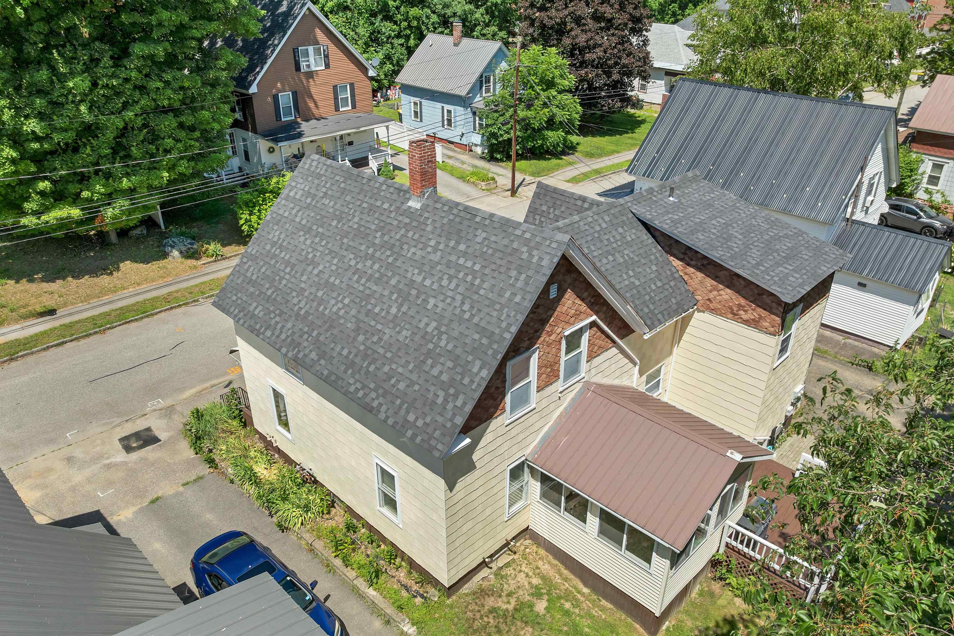 Existing metal roof over the sunroom