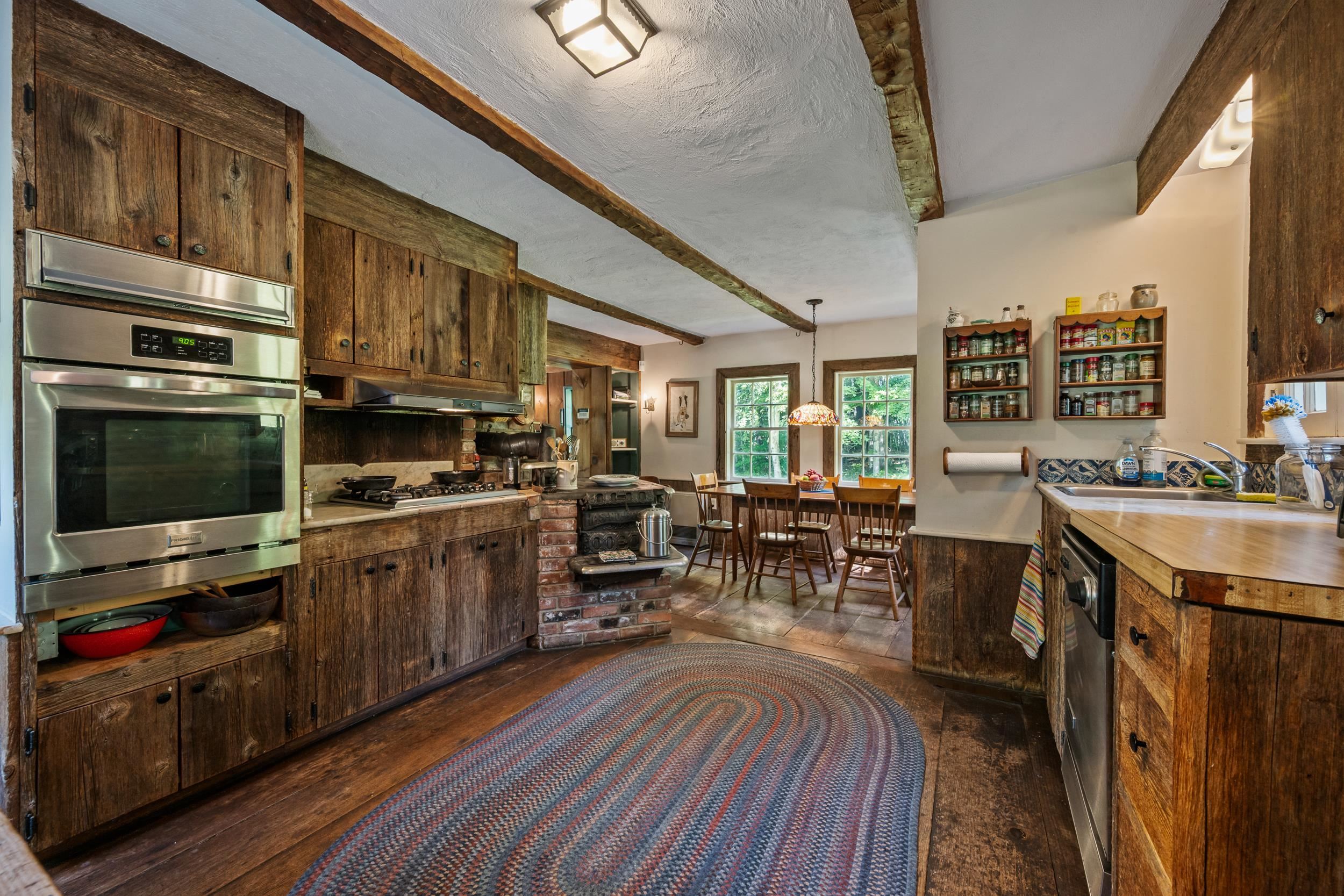THE KITCHEN OPENS TO THE DINING ROOM.