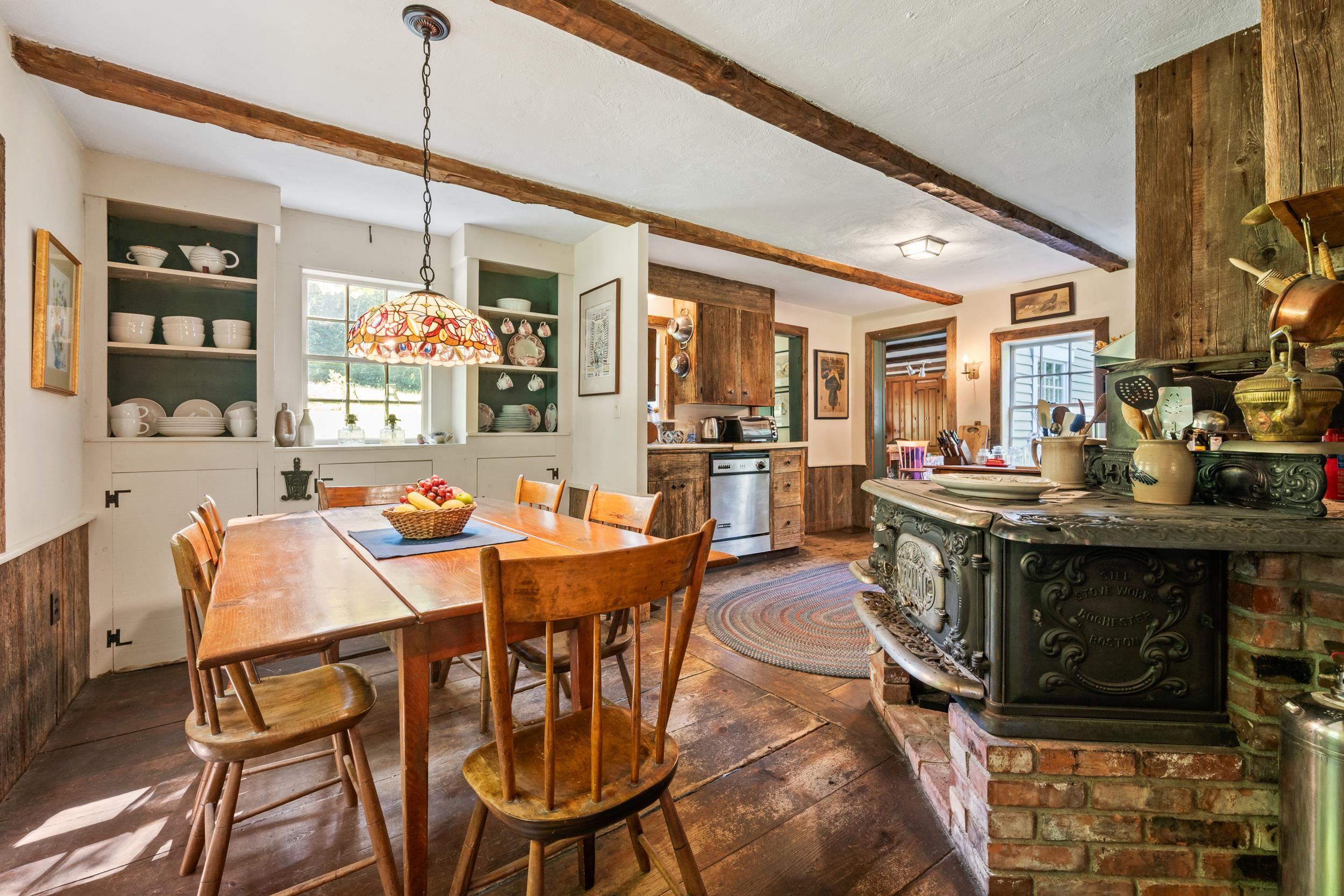 IN THE DINING ROOM ARE TWO BUILT IN CHINA CABINETS.