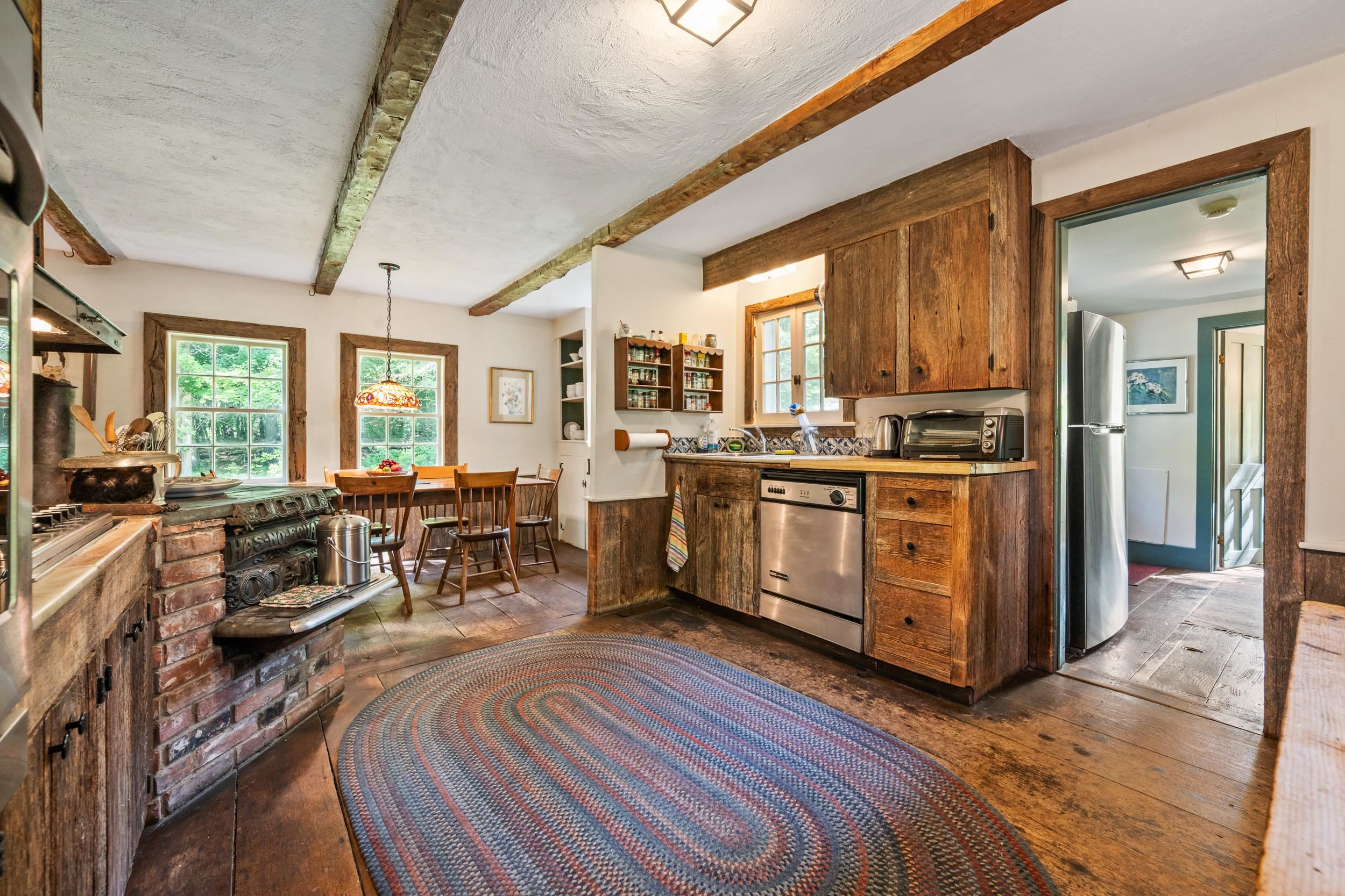 THE PINE WOOD FLOORS ARE IN THE KITCHEN/DINING AREA AS WELL.