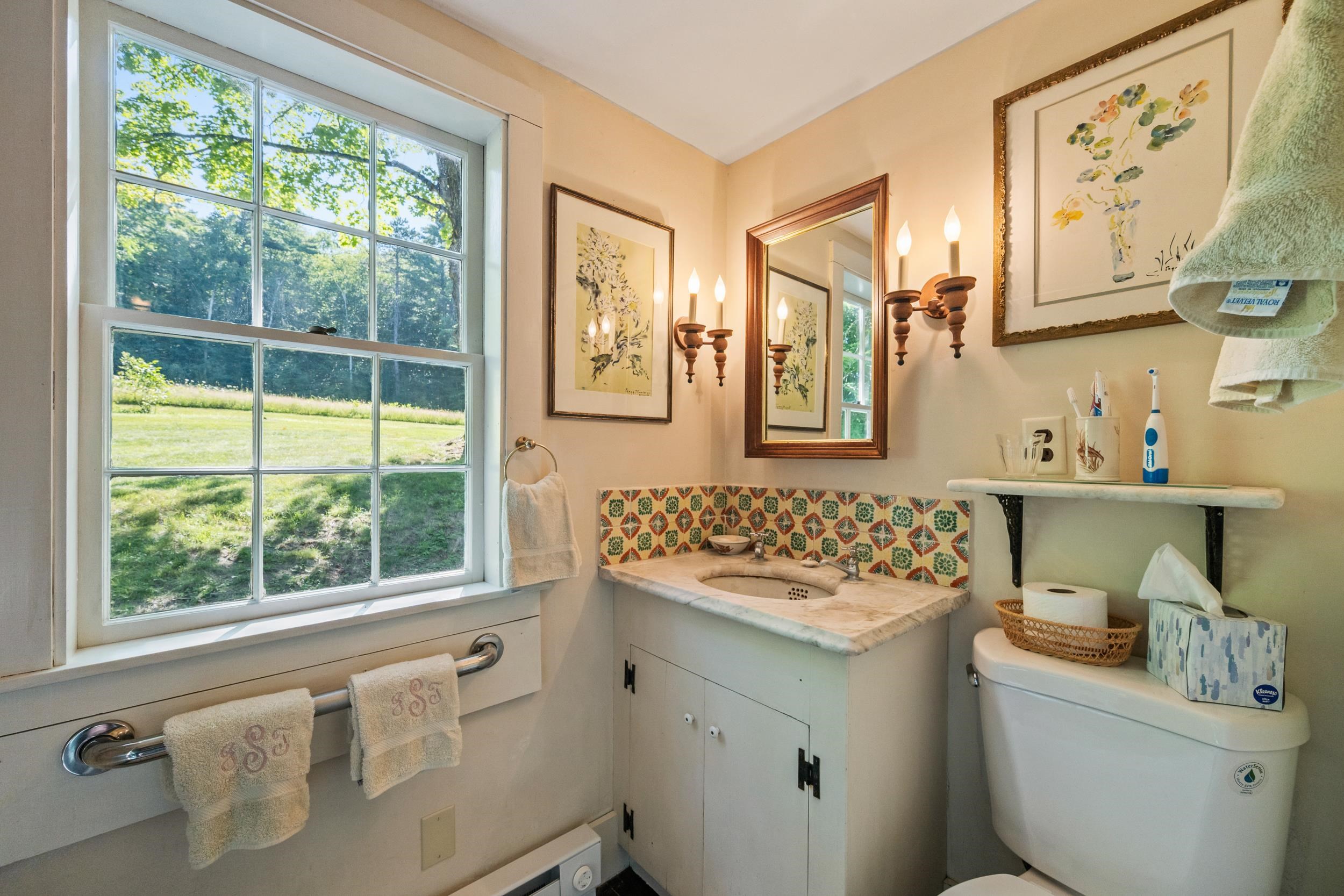 THERE IS A FULL BATH WITH ELECTRIC HEAT.