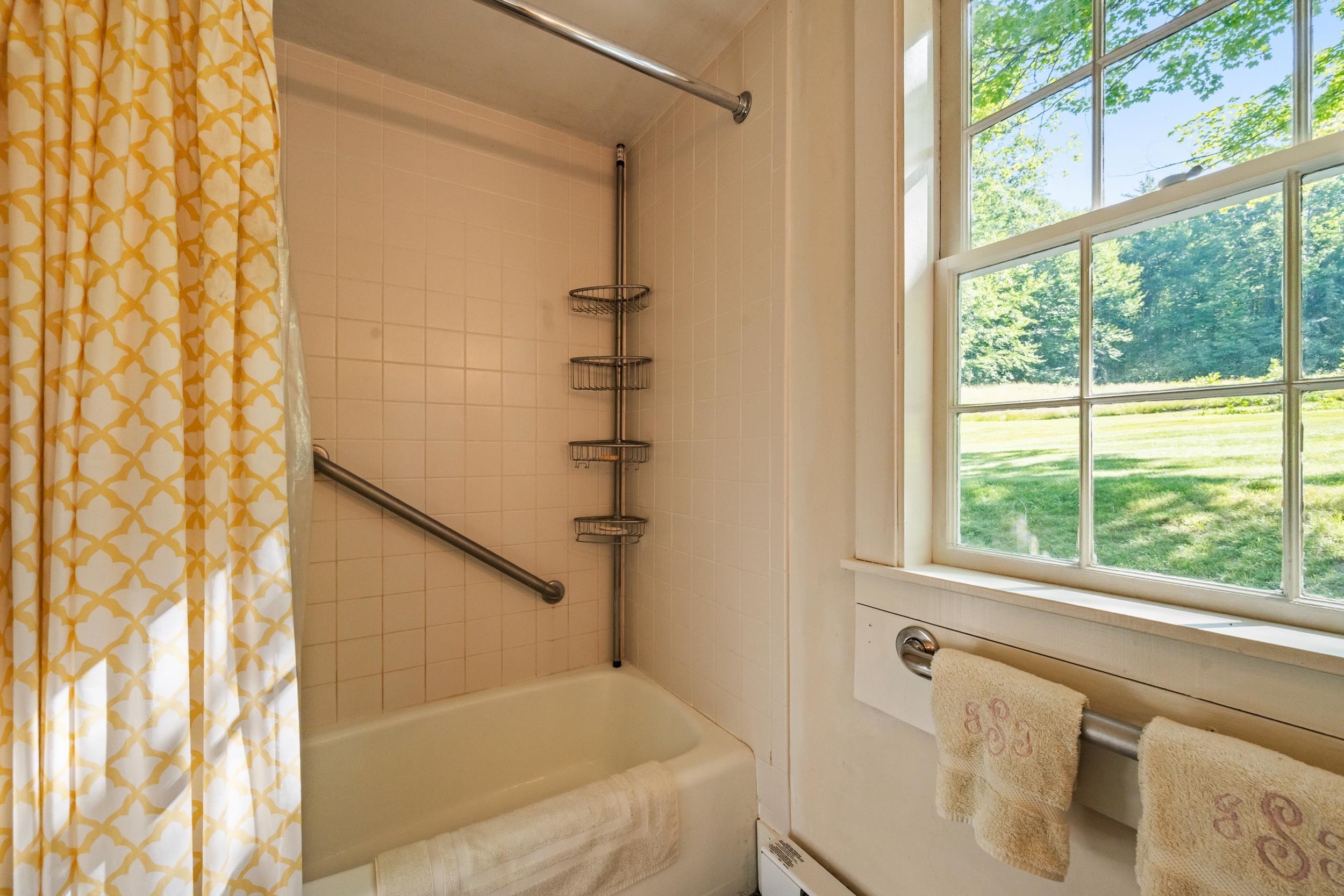 AND A FOUR FOOT TUB/SHOWER.