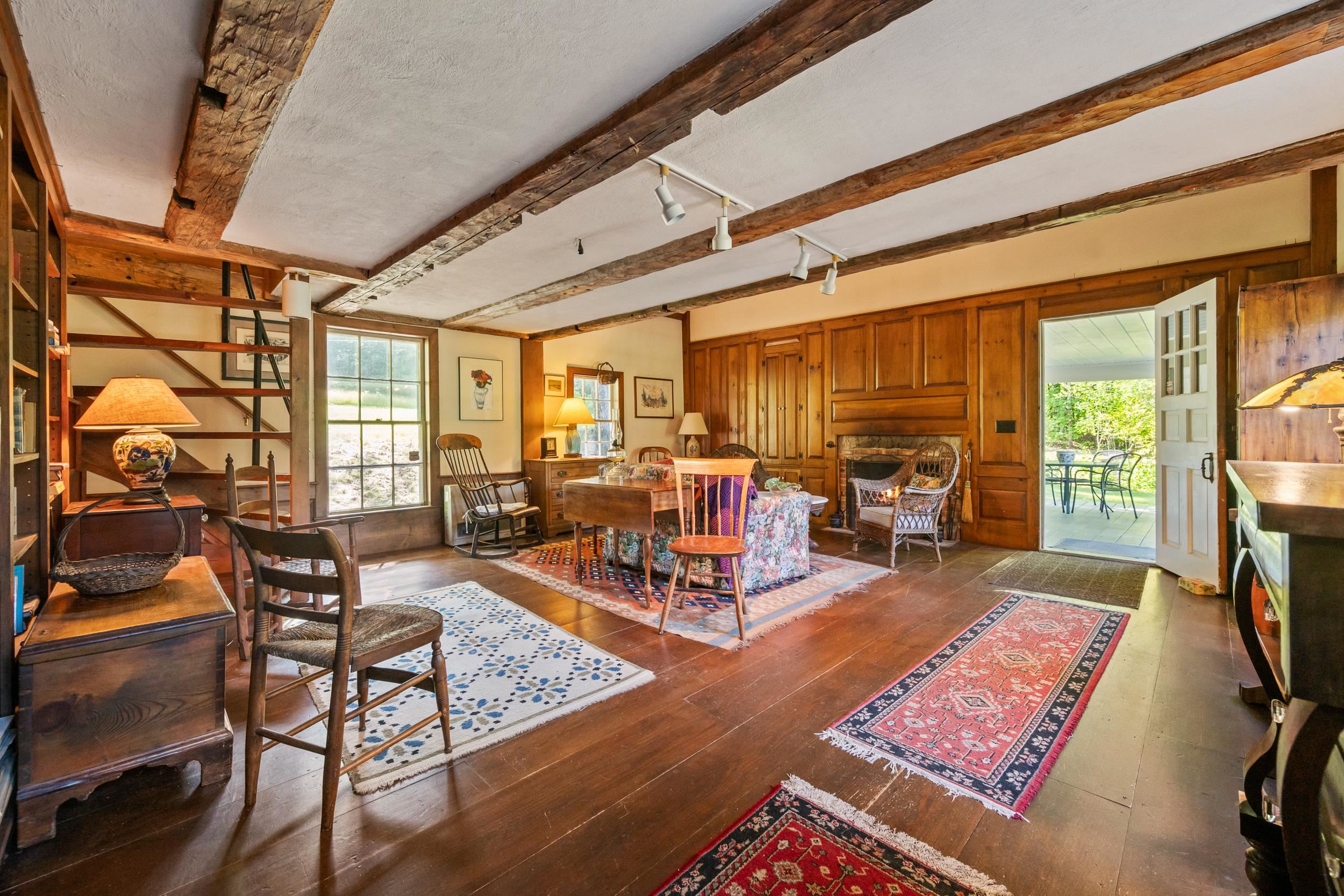 THE SECOND LIVING AREA IS OFF THE OTHER SIDE OF THE KITCHEN.