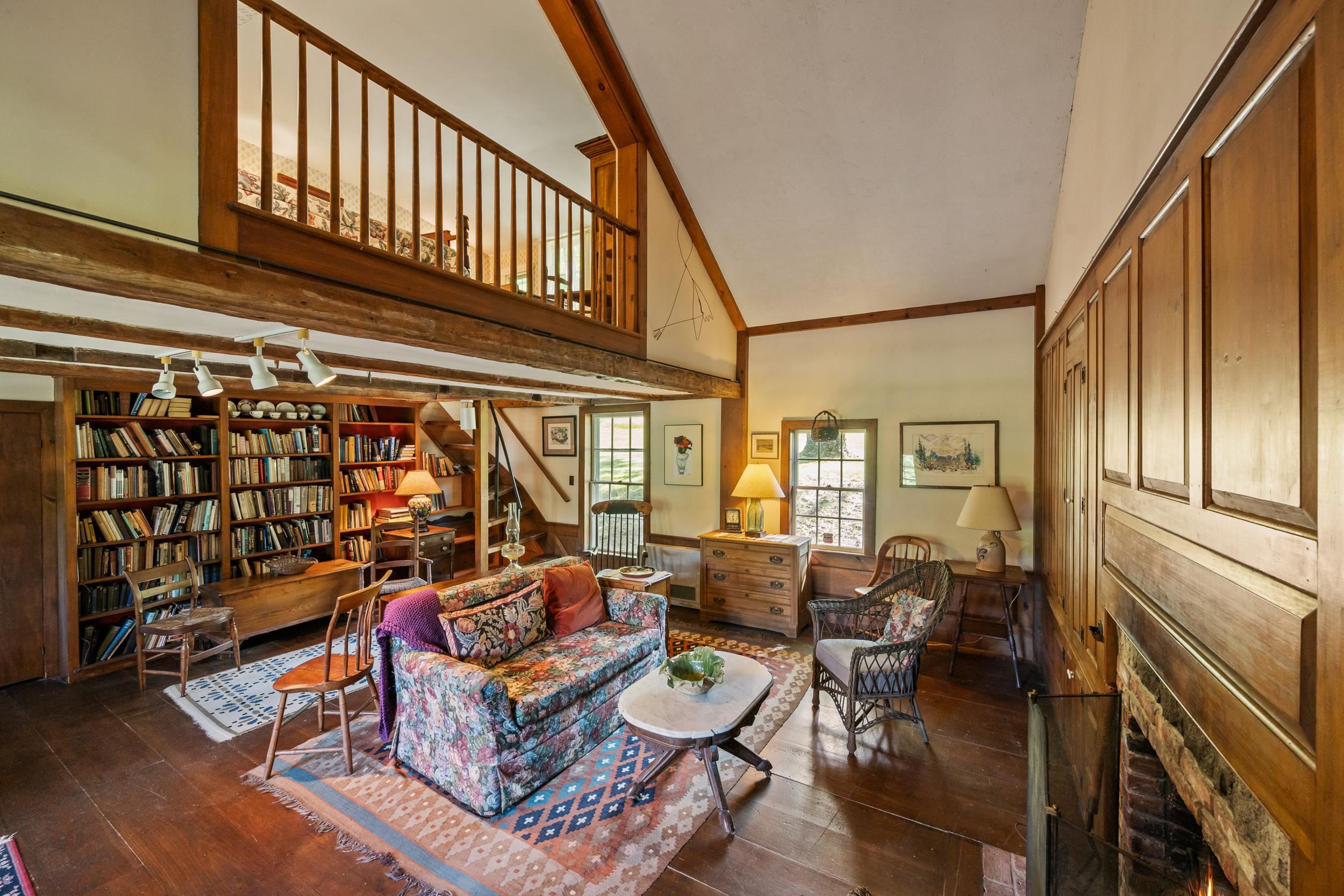 THERE IS A STAIRWELL TO THE SECOND FLOOR FROM OF THIS ROOM TO THE FIRST OF THE BEDROOMS.
