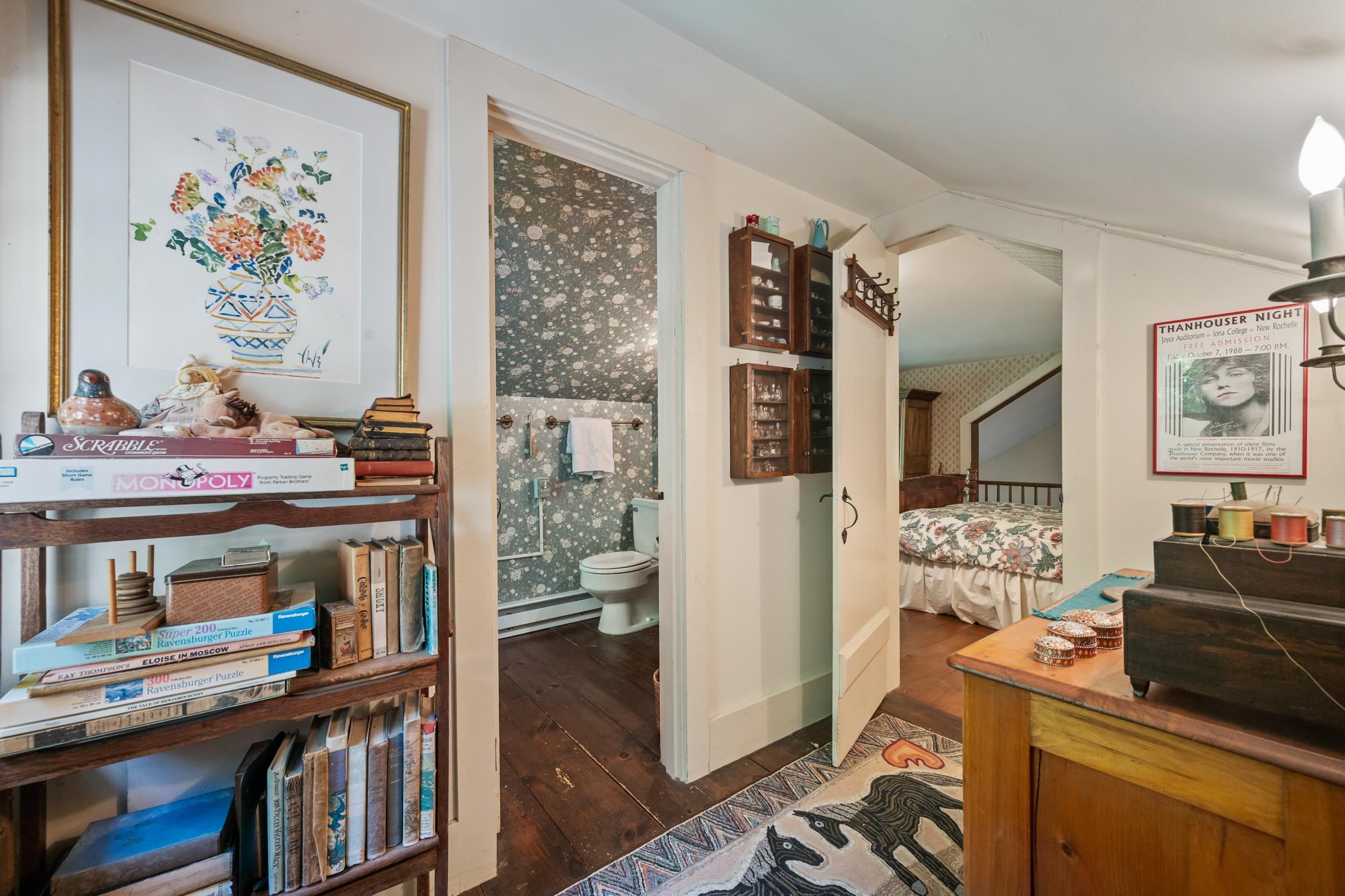 OFF THIS ROOM IS A "MIDDLE" ROOM WHICH LEADS TO 2ND FULL BATH AND 2 BEDROOMS - AND THE FRONT STAIRS.