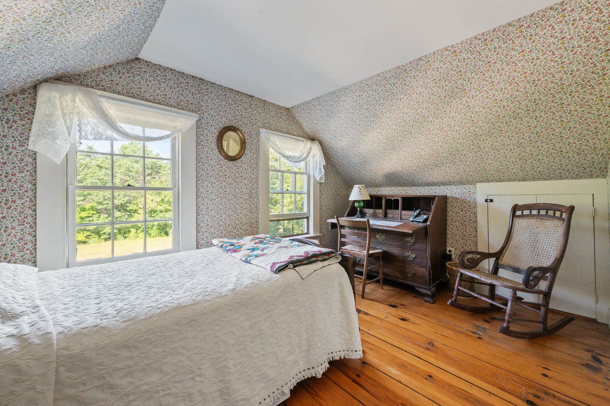 THIS ROOM IS NATURALLY LIGHT AND LOOKS TO THE FRONT OF THE HOUSE.