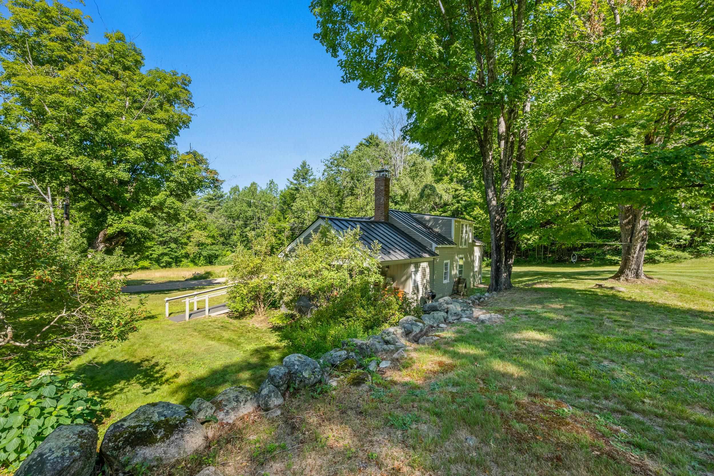 THERE IS AN APPEALING COMINATION OF STONEWALLS, OPEN FIELDS AND WOODS.