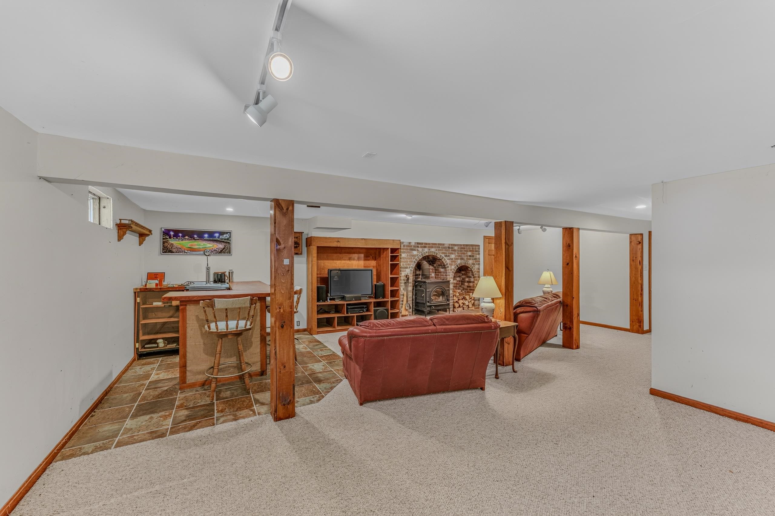 Lower Level Gathering Space, Bar, Wood Stove, Office