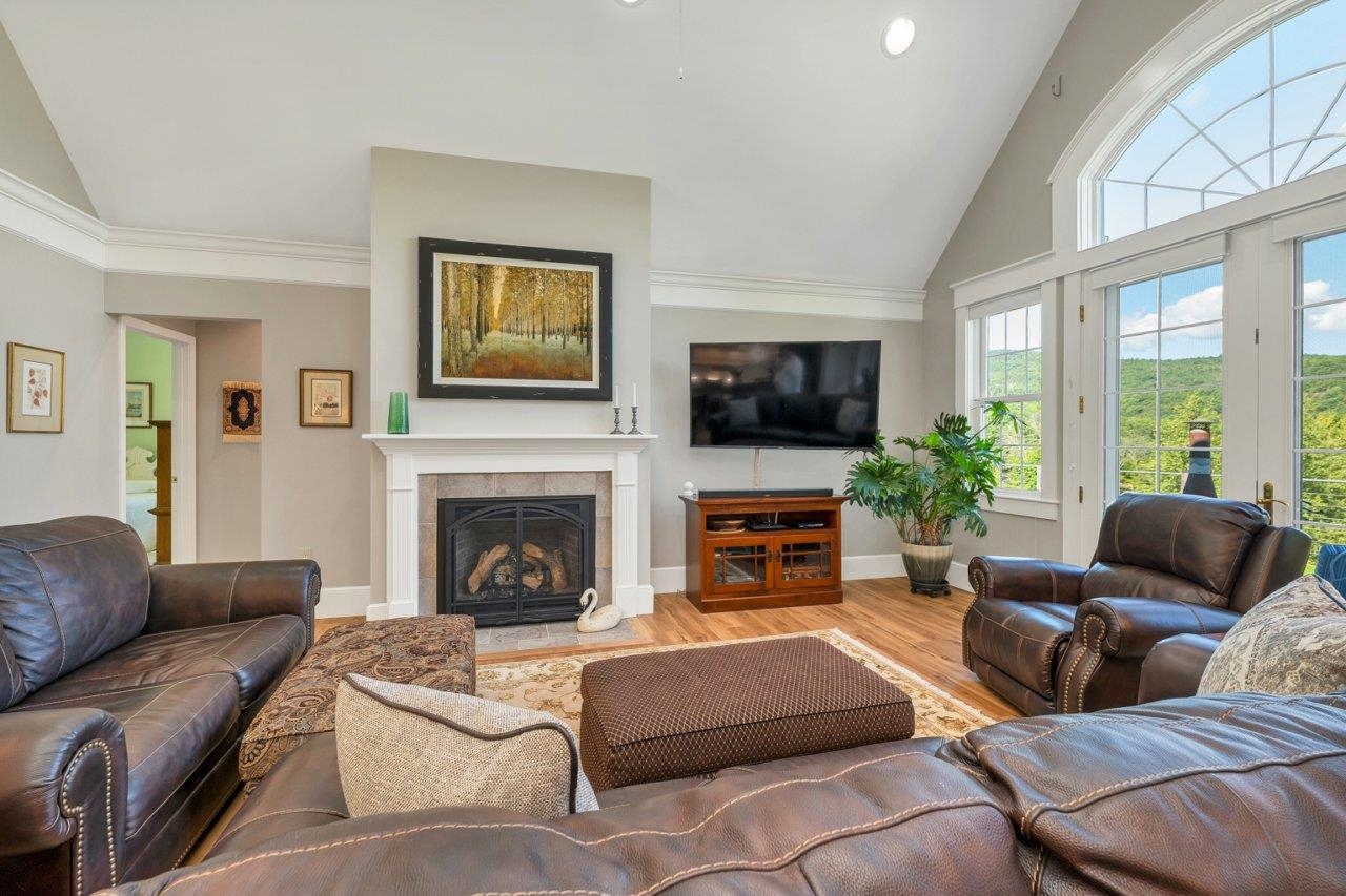 Behind the fireplace, 2 bedrooms and a bath