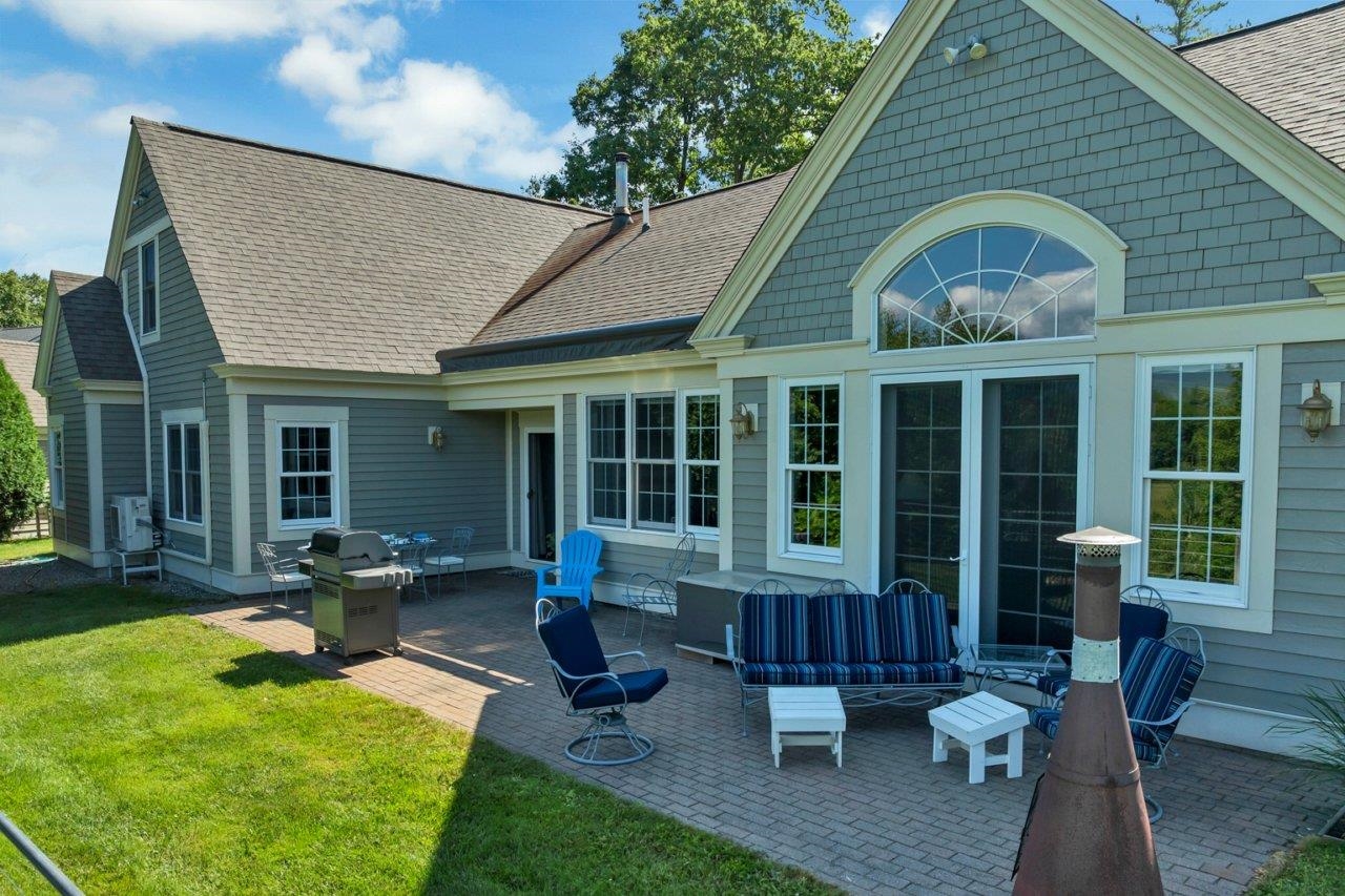 Brick patio with the awning in.