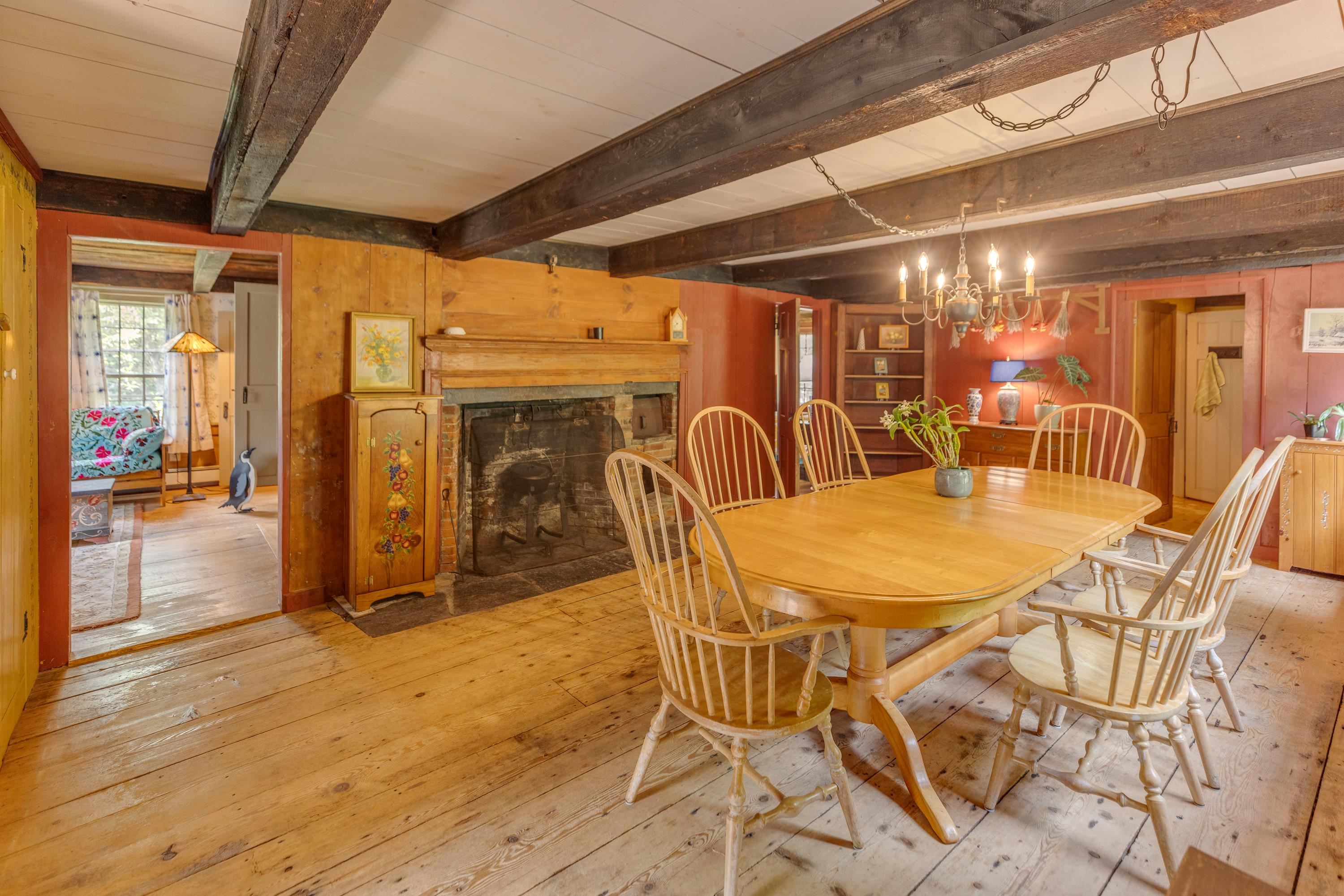 Dining room with beautiful wide plank board flooring 25888271