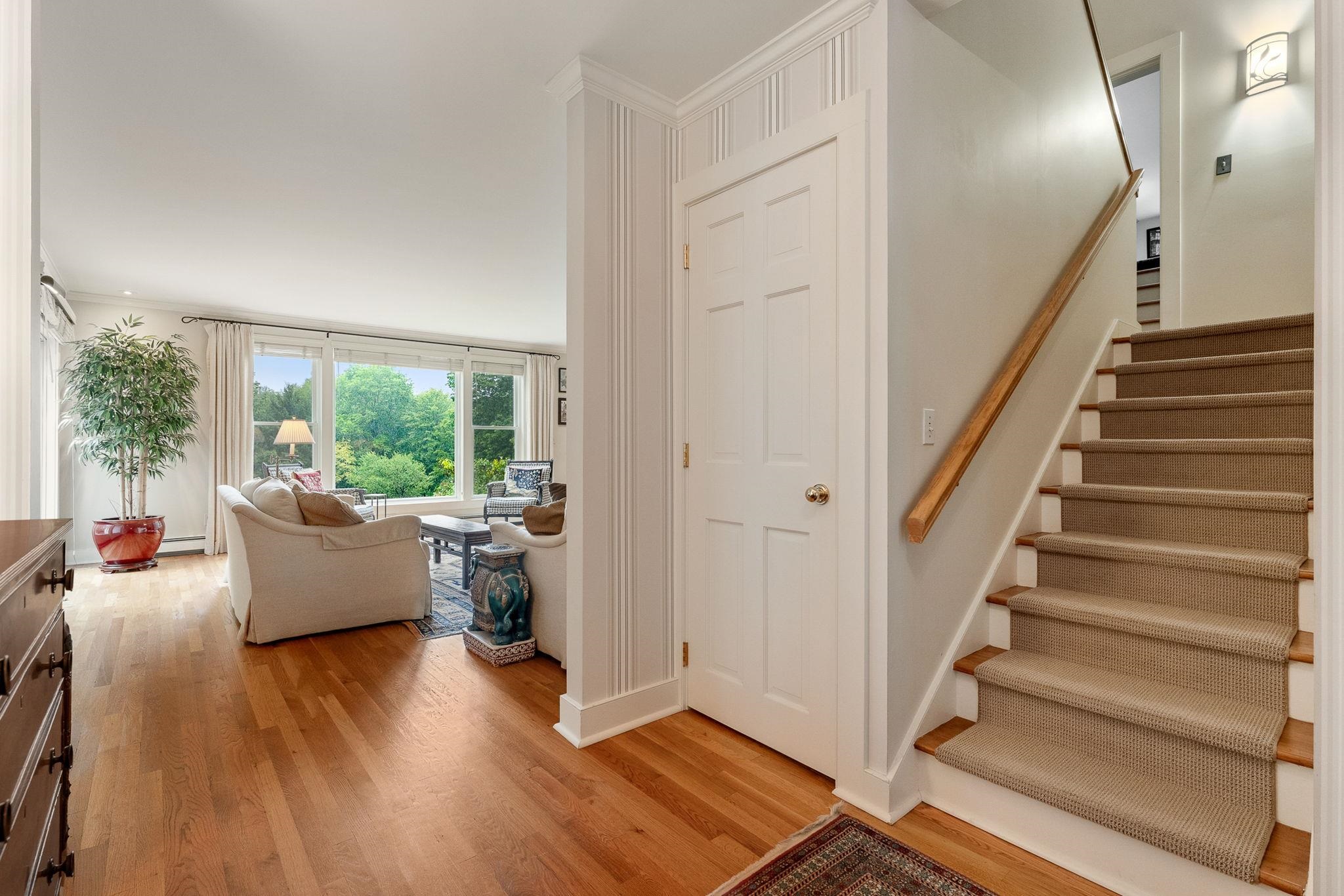 Stairs off entry to Guest Bedroom & Media 25903319