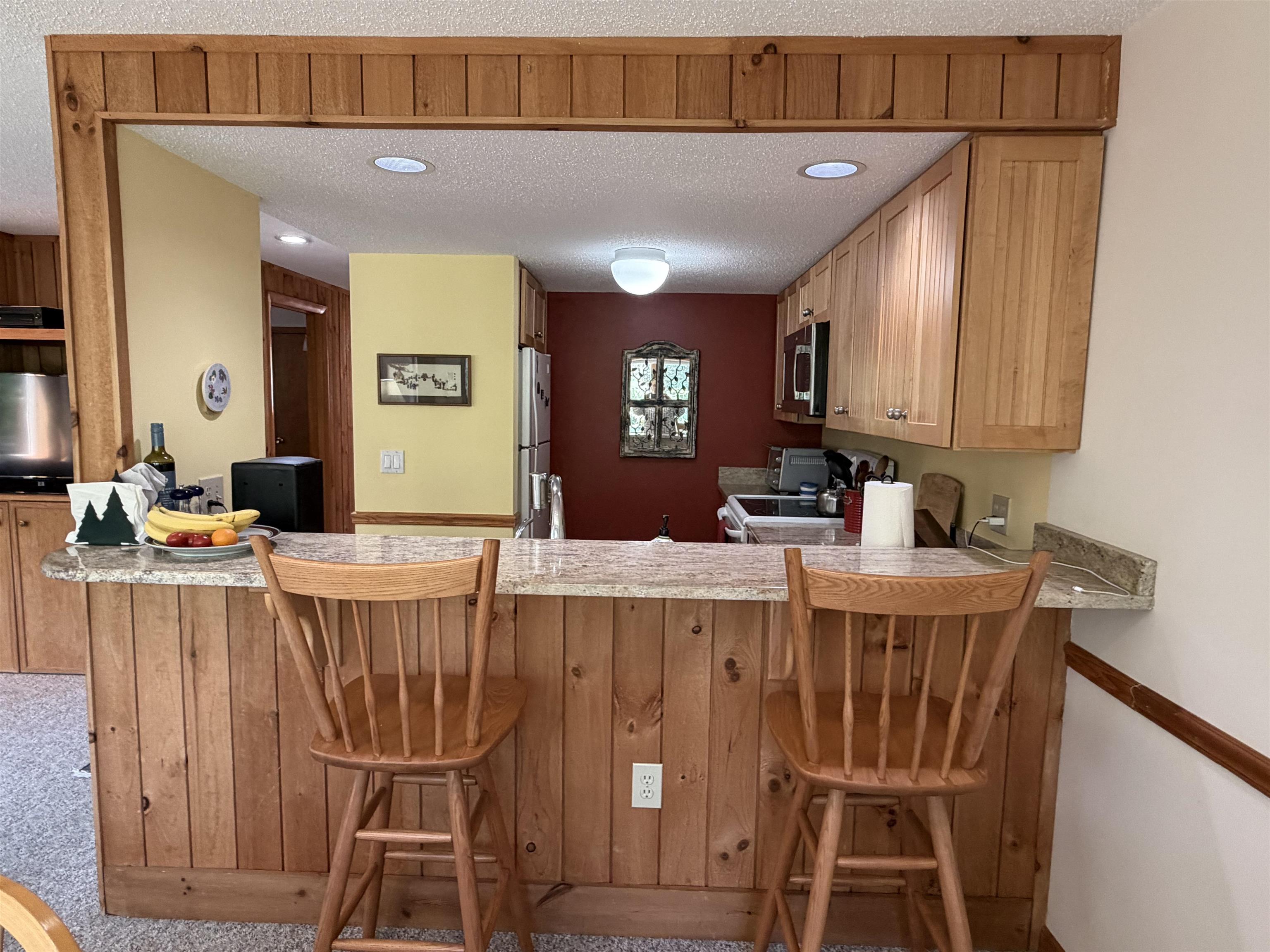 Breakfast bar overlooks the kitchen