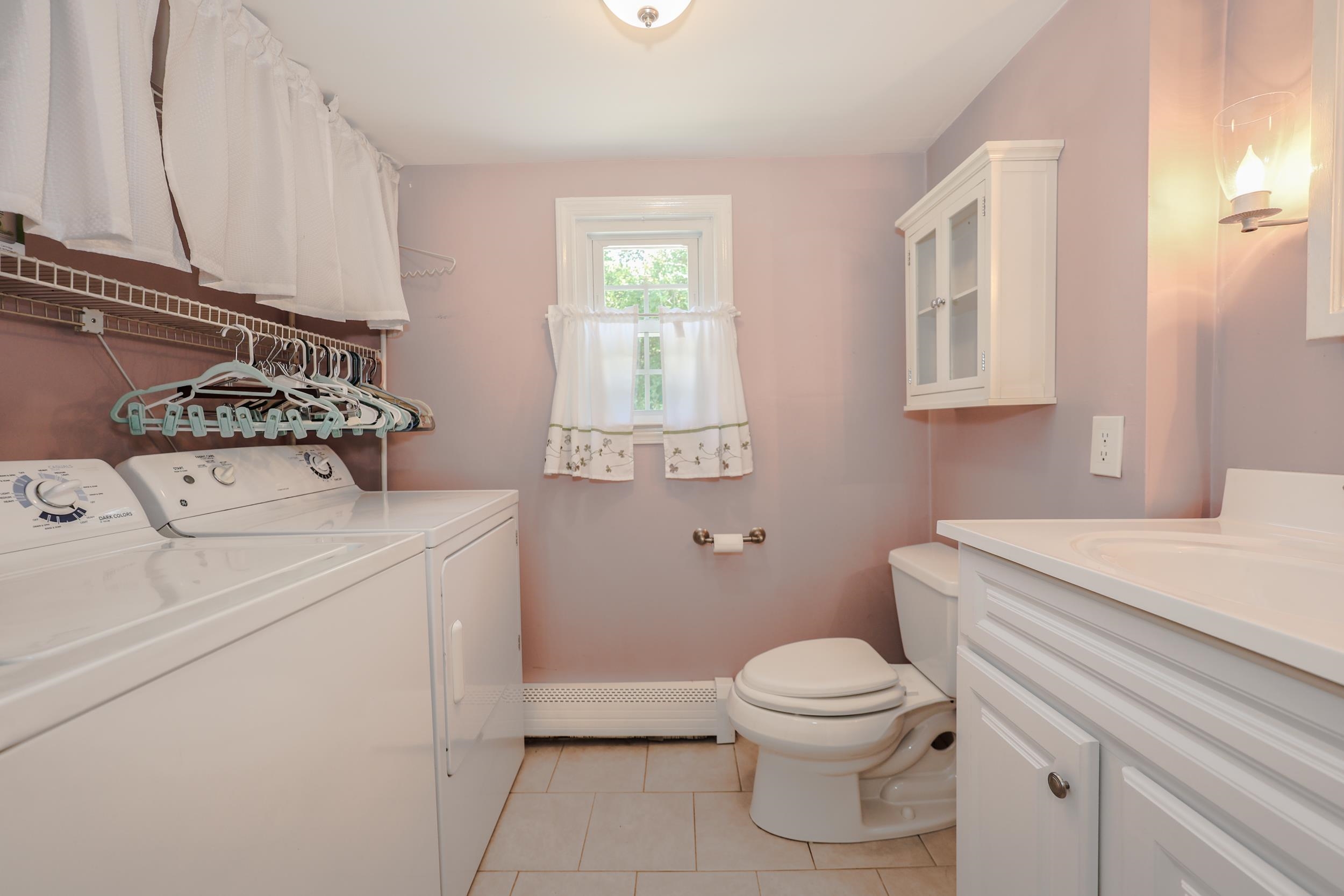 Half bathroom with laundry 25925394