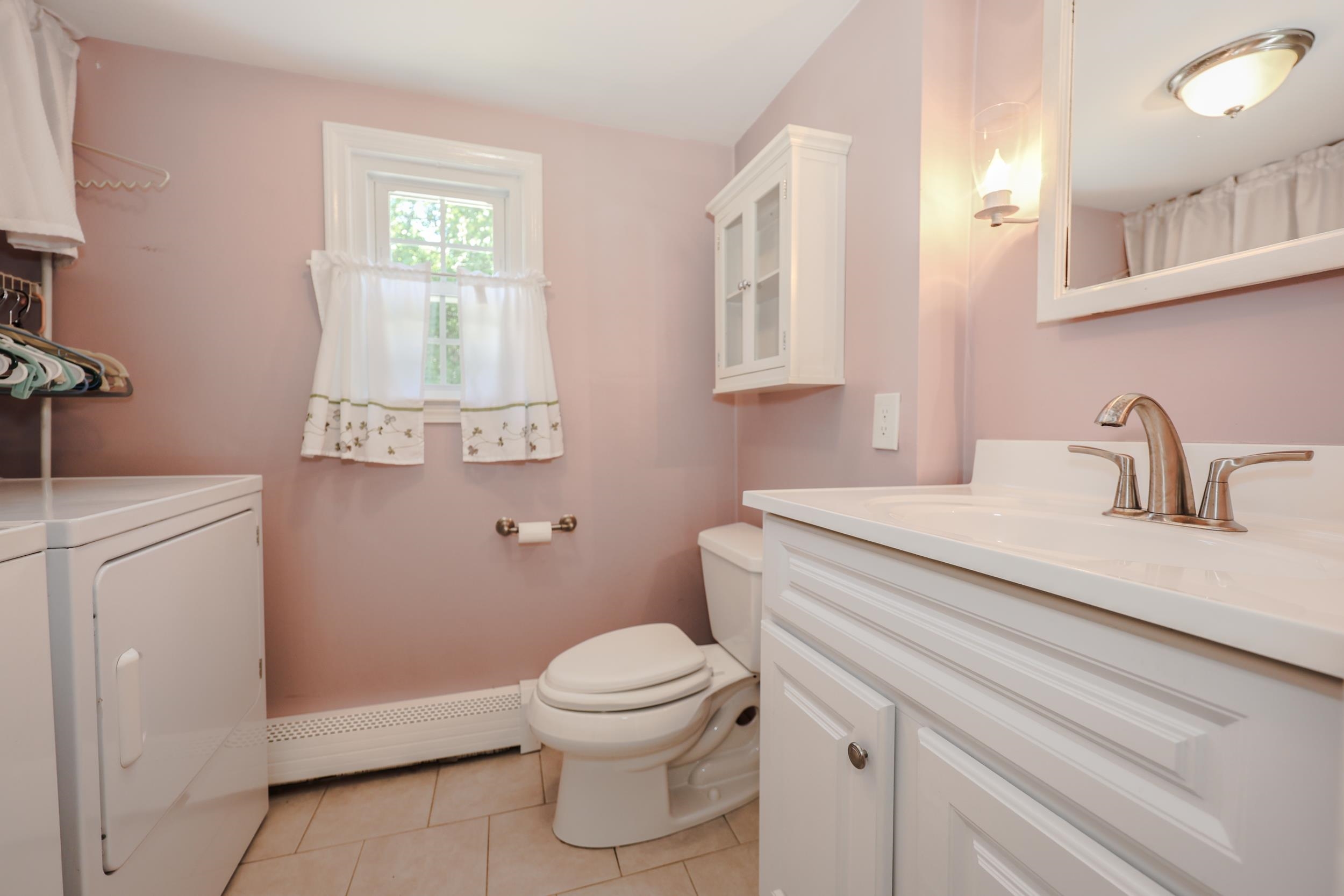 Half bathroom with laundry 25925395