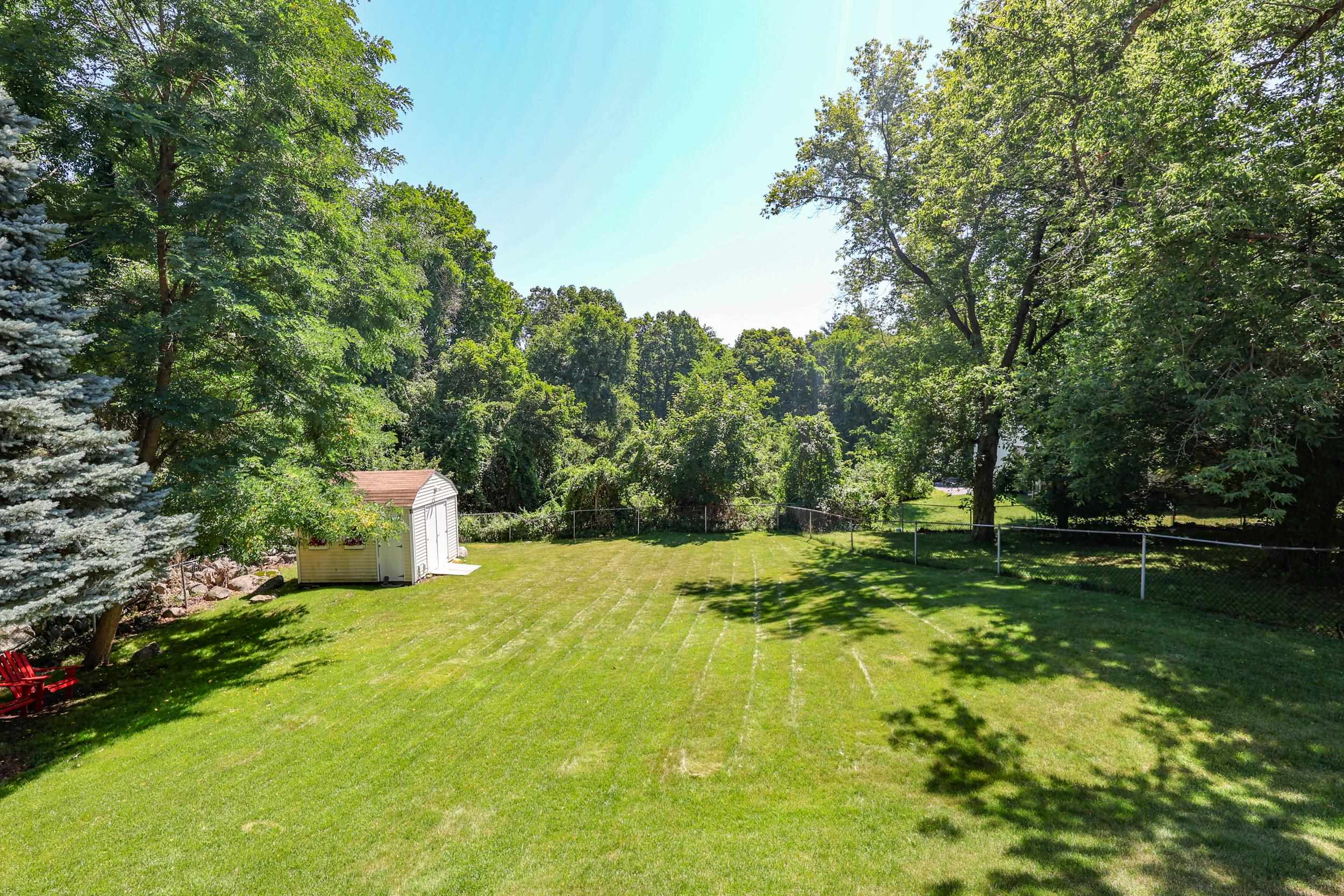 Fully fenced in yard 25925355