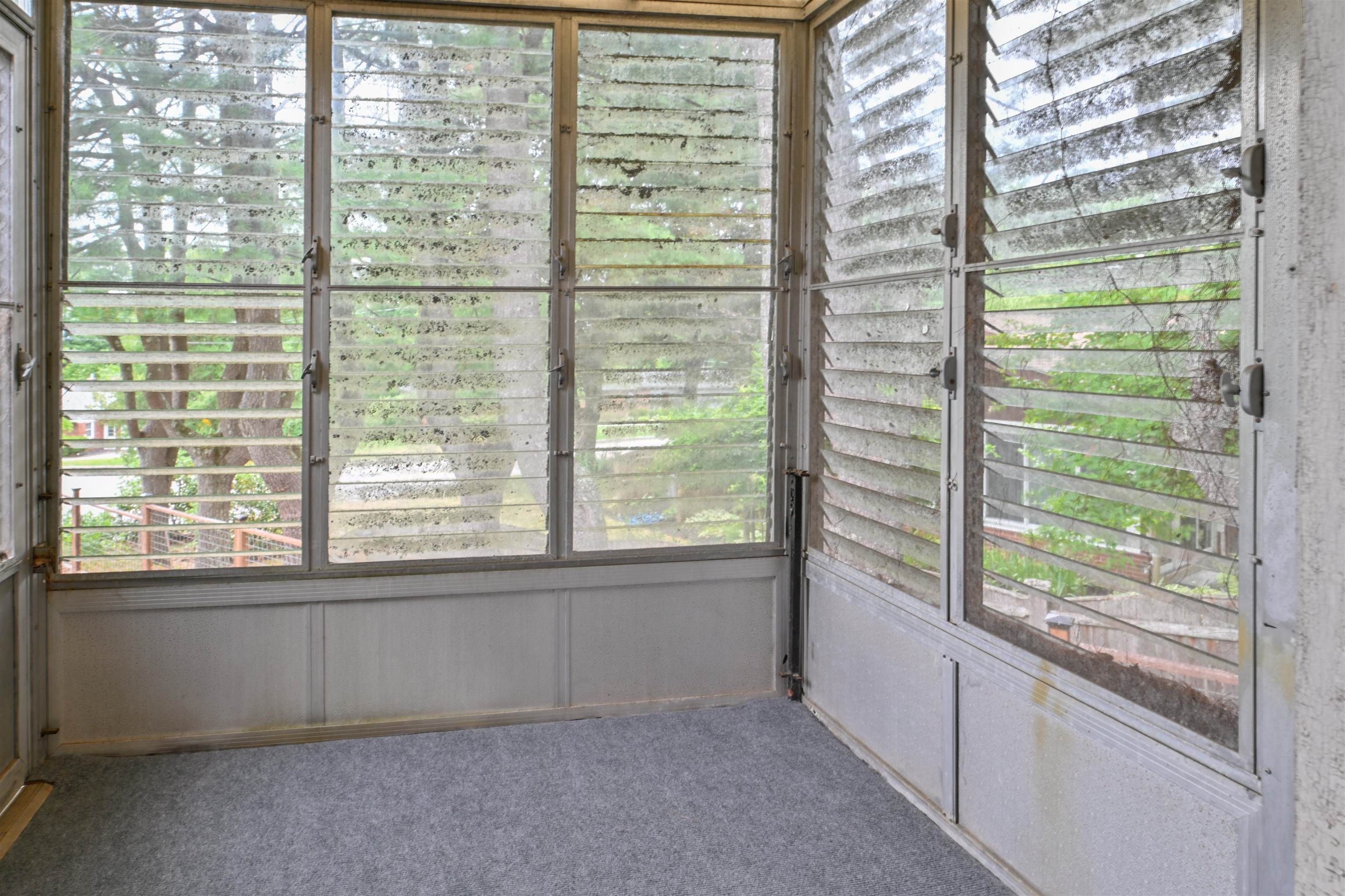 Screen porch with jalousie windows 25924359