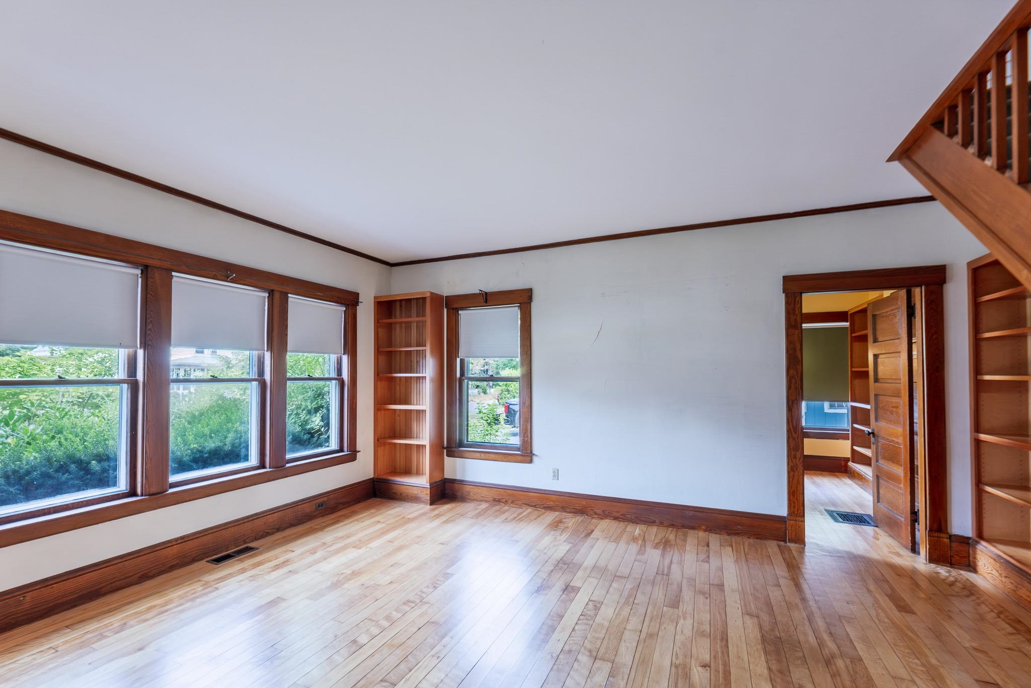 Living room off dining room with beautiful hardwood floors 25911409