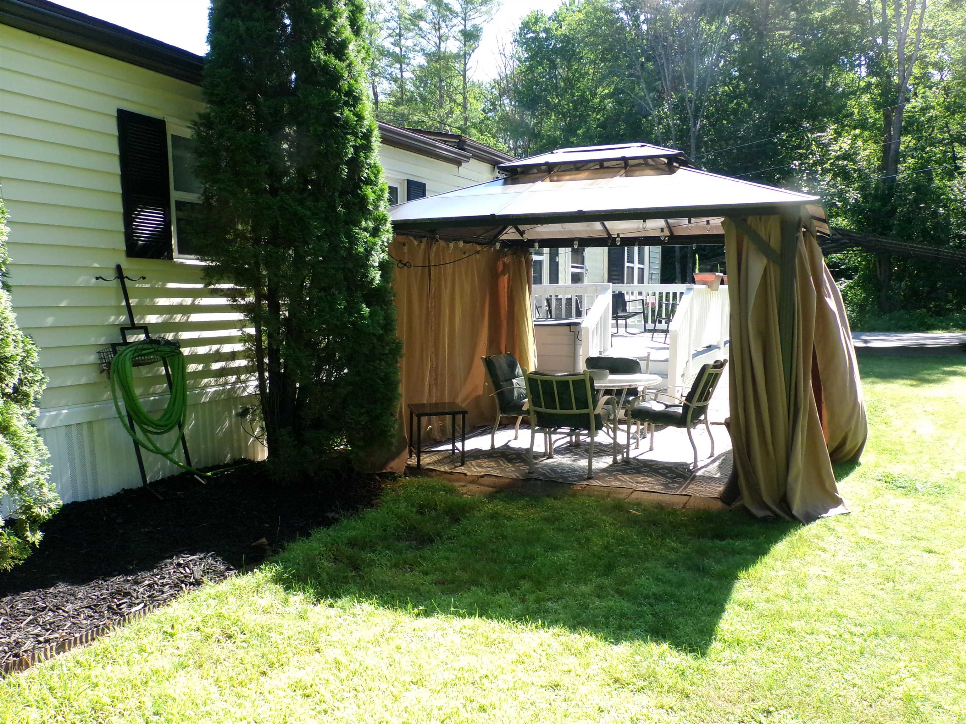 Netted and rain shields on new gazebo