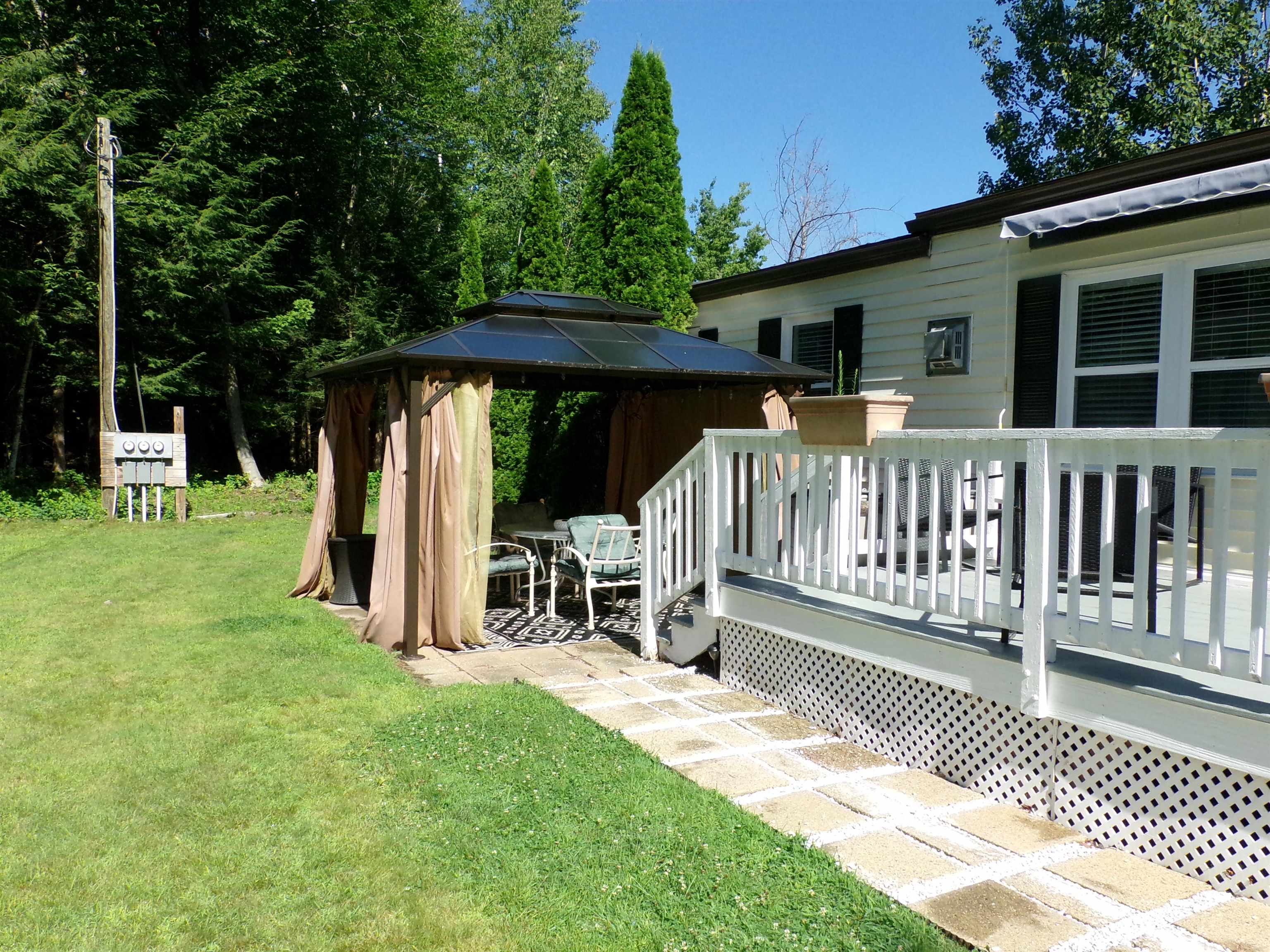 Level walkway to gazebo and shed in back