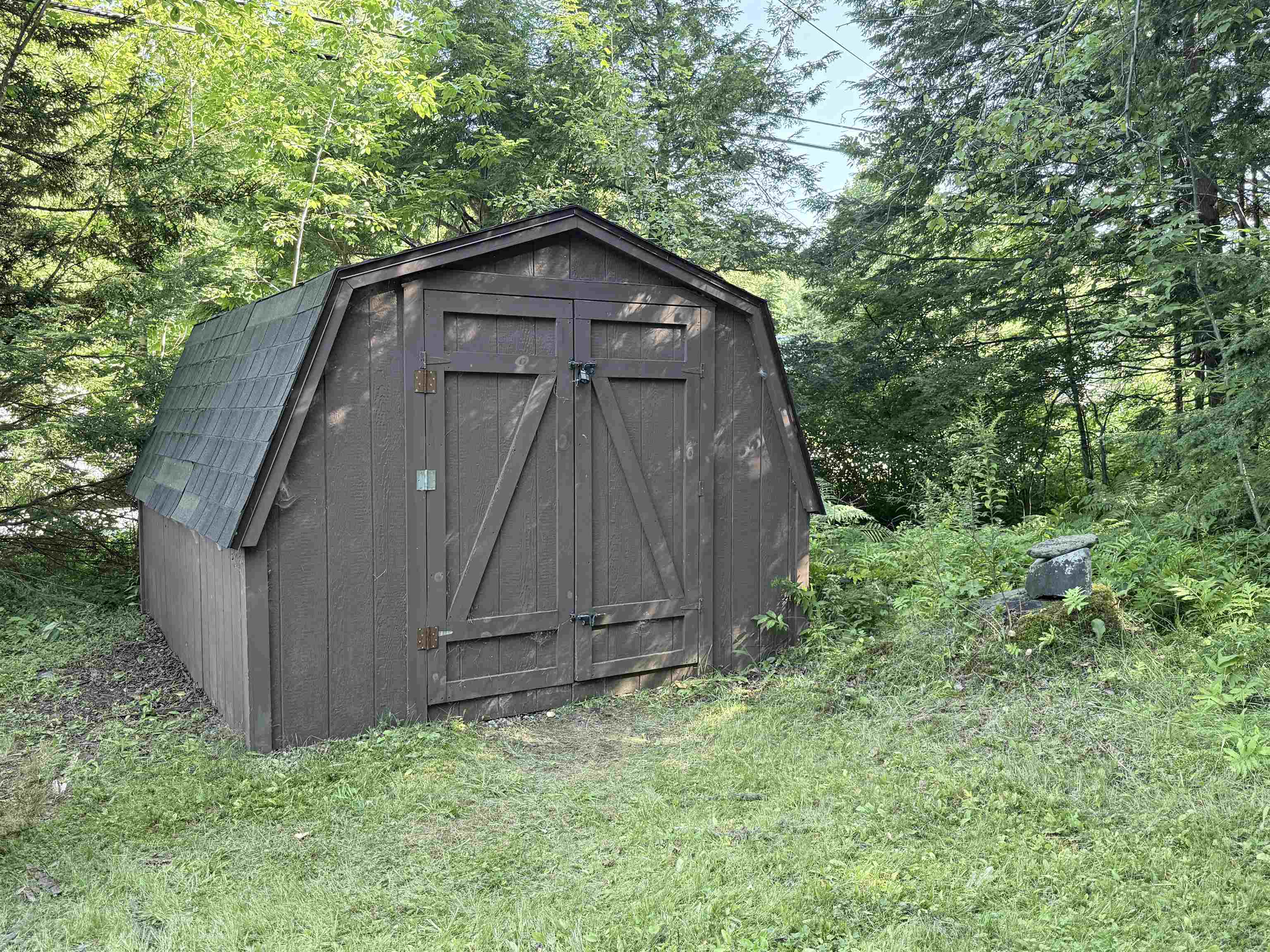 Great shed for mower, snowblower, generator, bike, skis! 25936666