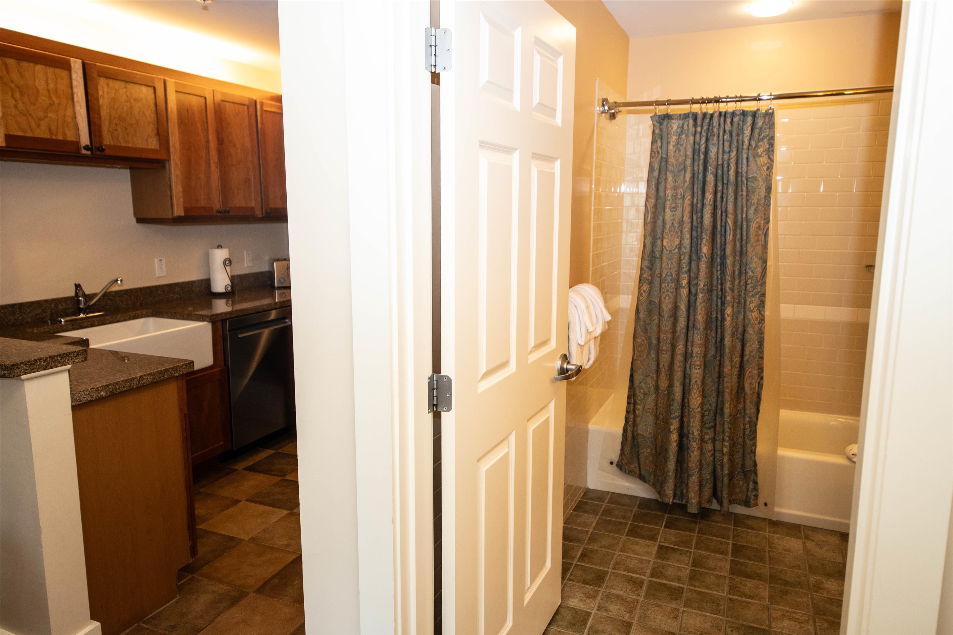 Full bathroom right off kitchen/dining area