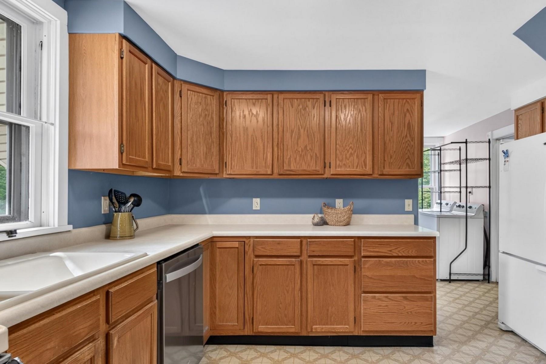 Unit 1 Kitchen with laundry.